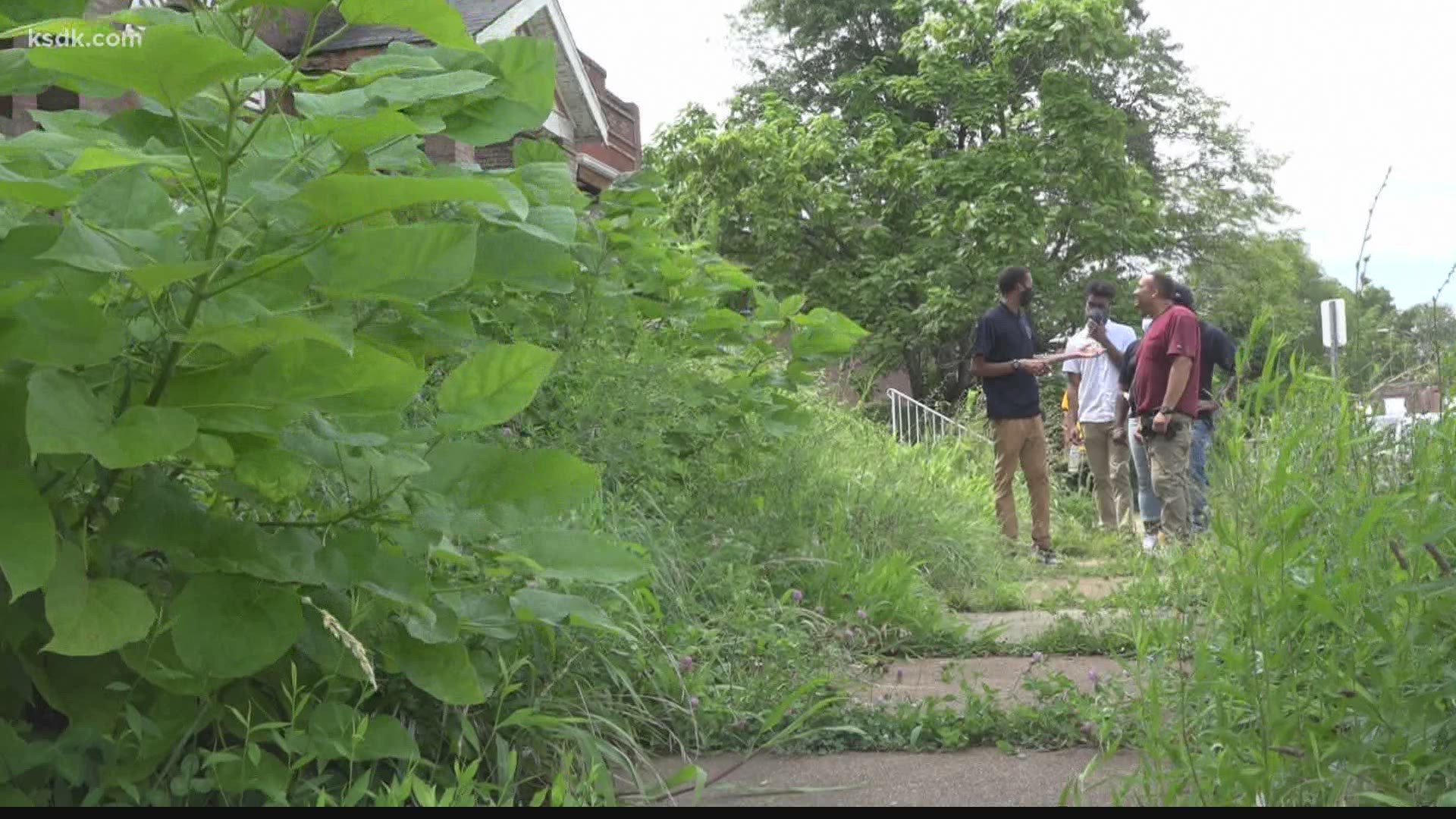 Young people in north St. Louis were busy Sunday revitalizing homes in the Wells-Goodfellow neighborhood