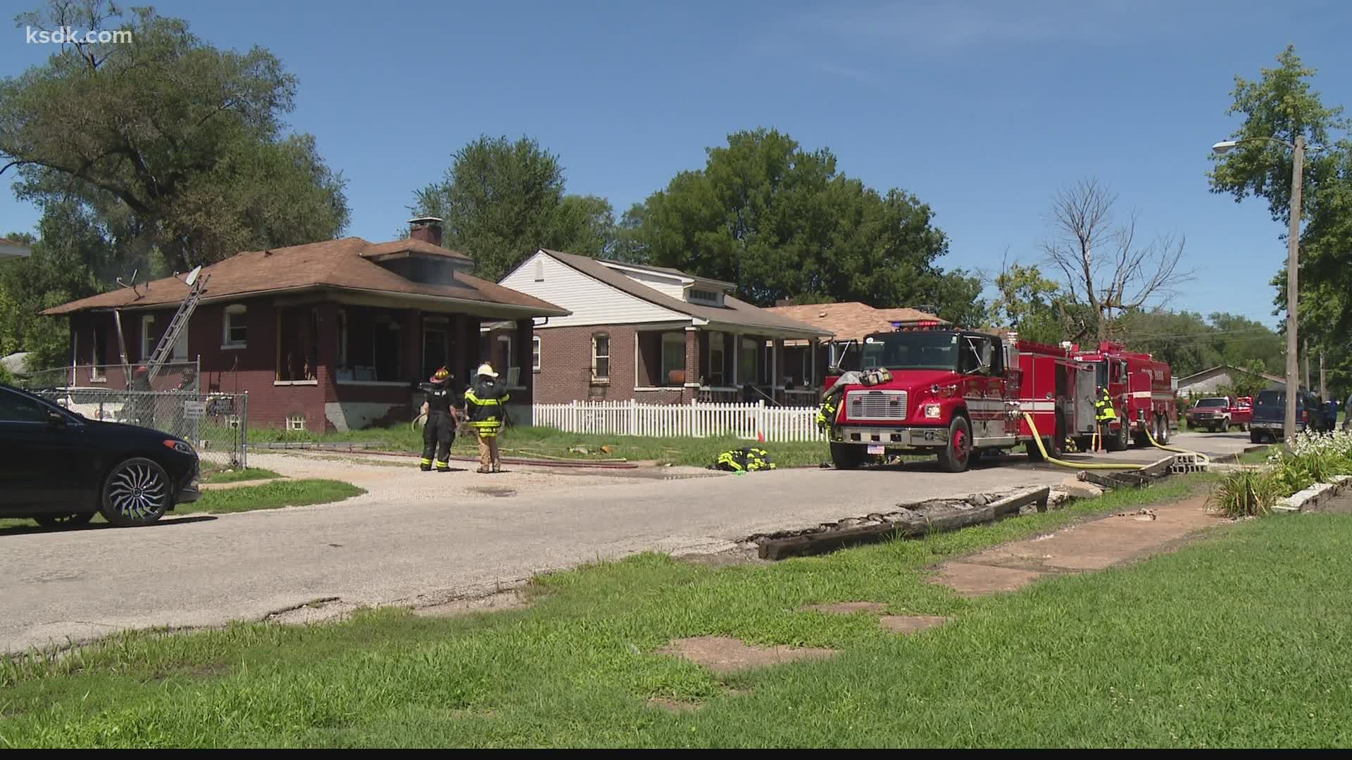 A couple of Washington Park firefighters became overheated while battling the fire. They were expected to be OK.