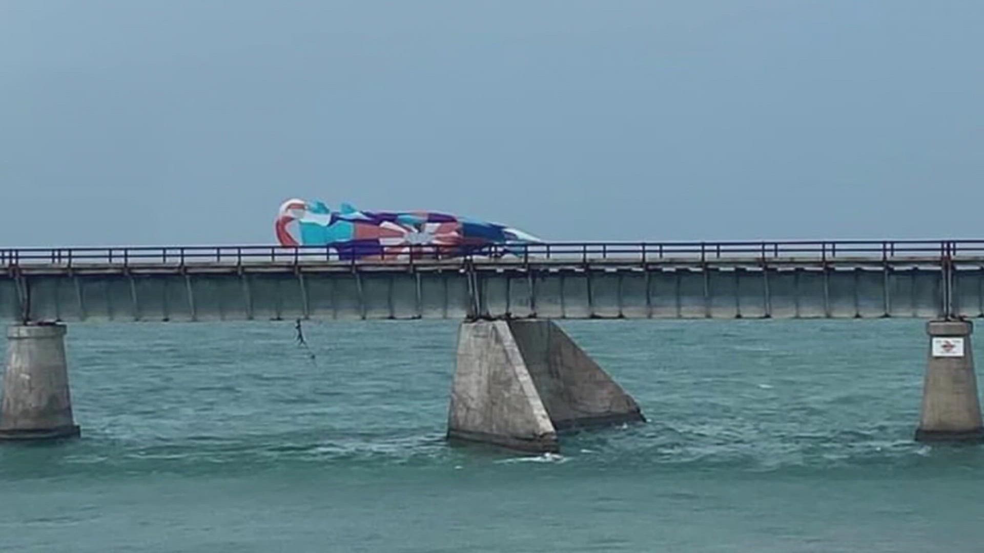 A tourist from Illinois was killed and two children were injured when their parasail was cut loose during a sudden storm in the Florida Keys.