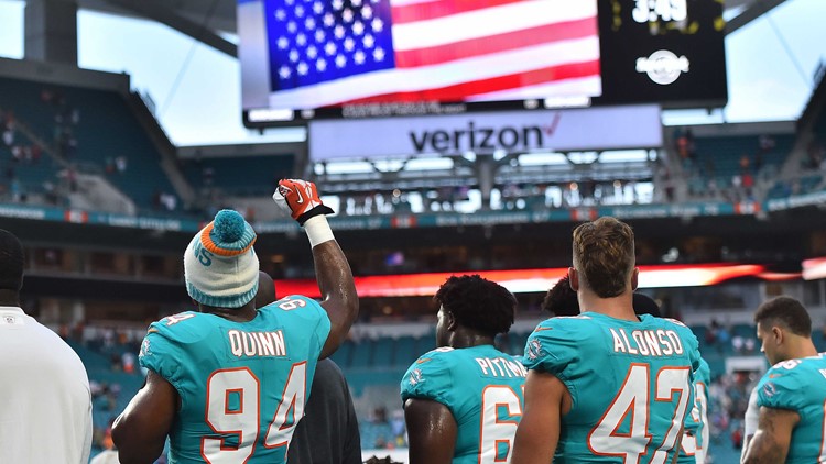 Dolphins, Seattle Seahawks stay in locker room, kneel during anthem