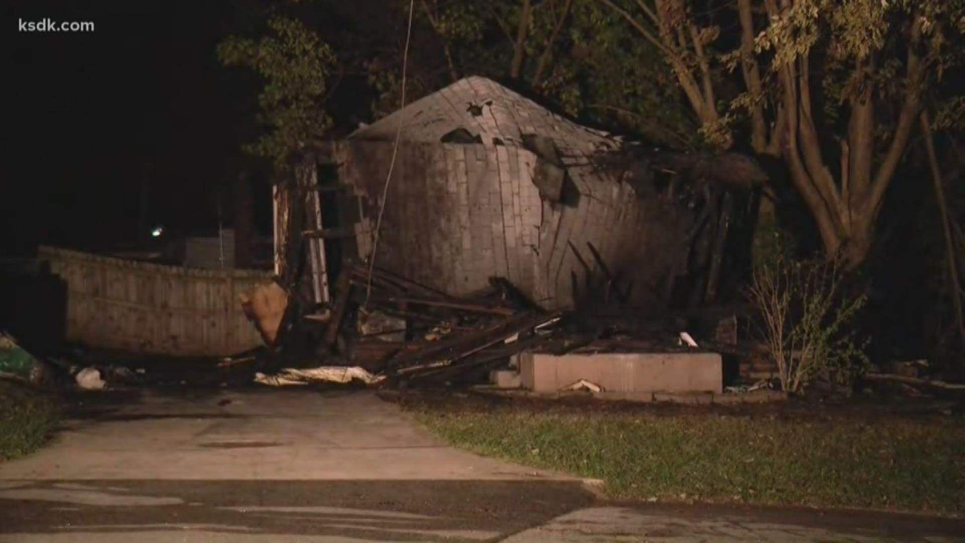 Firefighters battled another fire at a home on Tuesday on Diamond Drive, right behind this home.