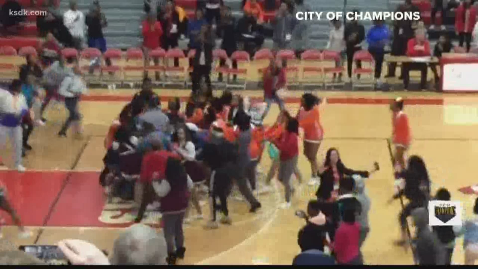 East St. Louis, Trinity Catholic cheerleaders fight on the court