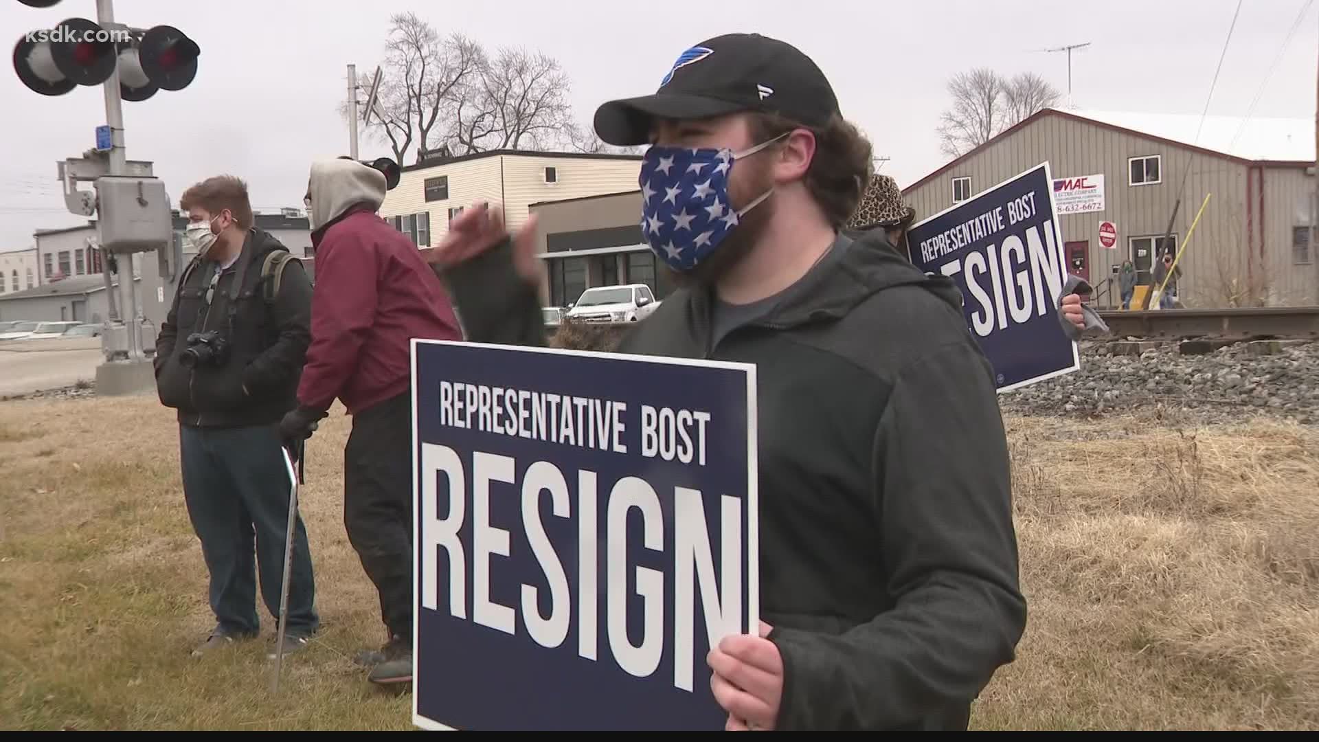 About two dozen protesters gathered on Saturday