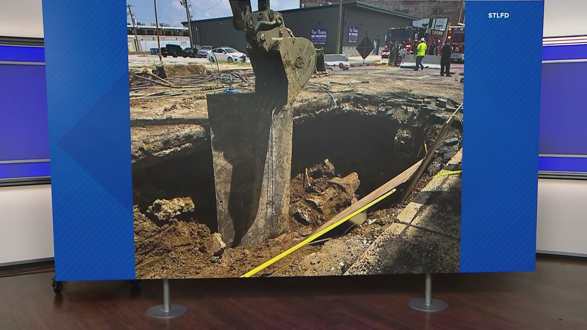 A worker is recovering from serious injuries after falling 15 feet into a large sinkhole in north St. Louis. It happened Monday afternoon on North Broadway.
