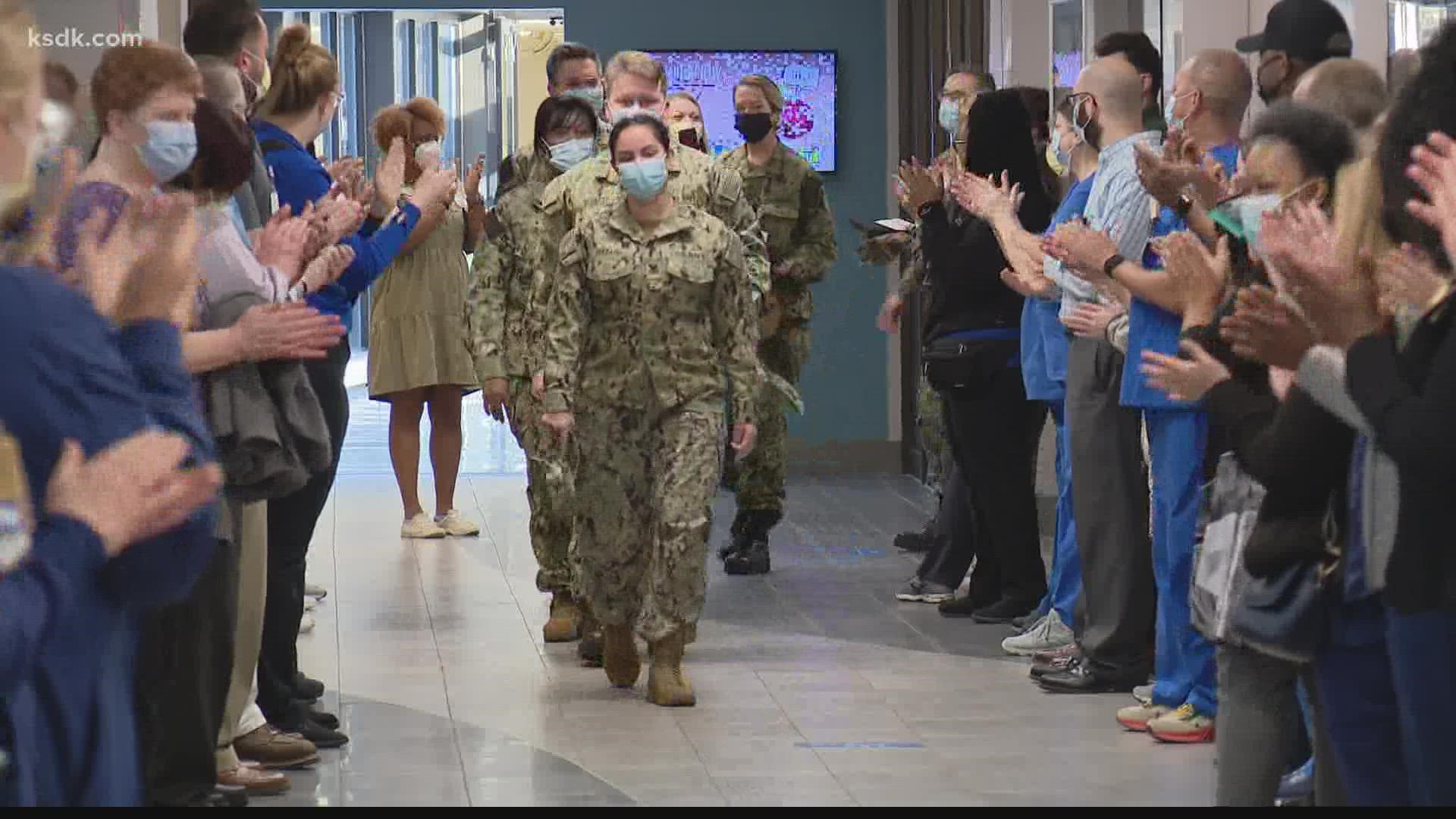 The Christian Hospital staff lined the hallway and cheered the team, saying "thank you" as they left.