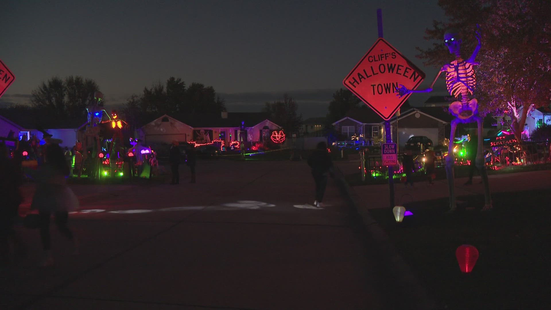 Local families brave chilly temperatures for trick-or-treating. Temperatures are in the low 40s on Halloween night.