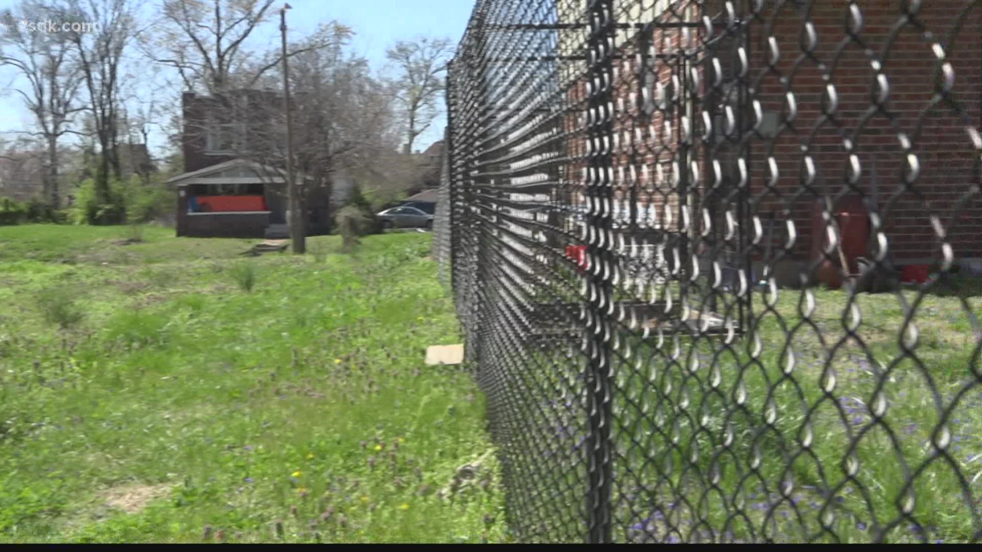 A north St. Louis woman claims workers from the City of St. Louis tore down her fence while clearing a nearby lot, and then refused to pay for it.