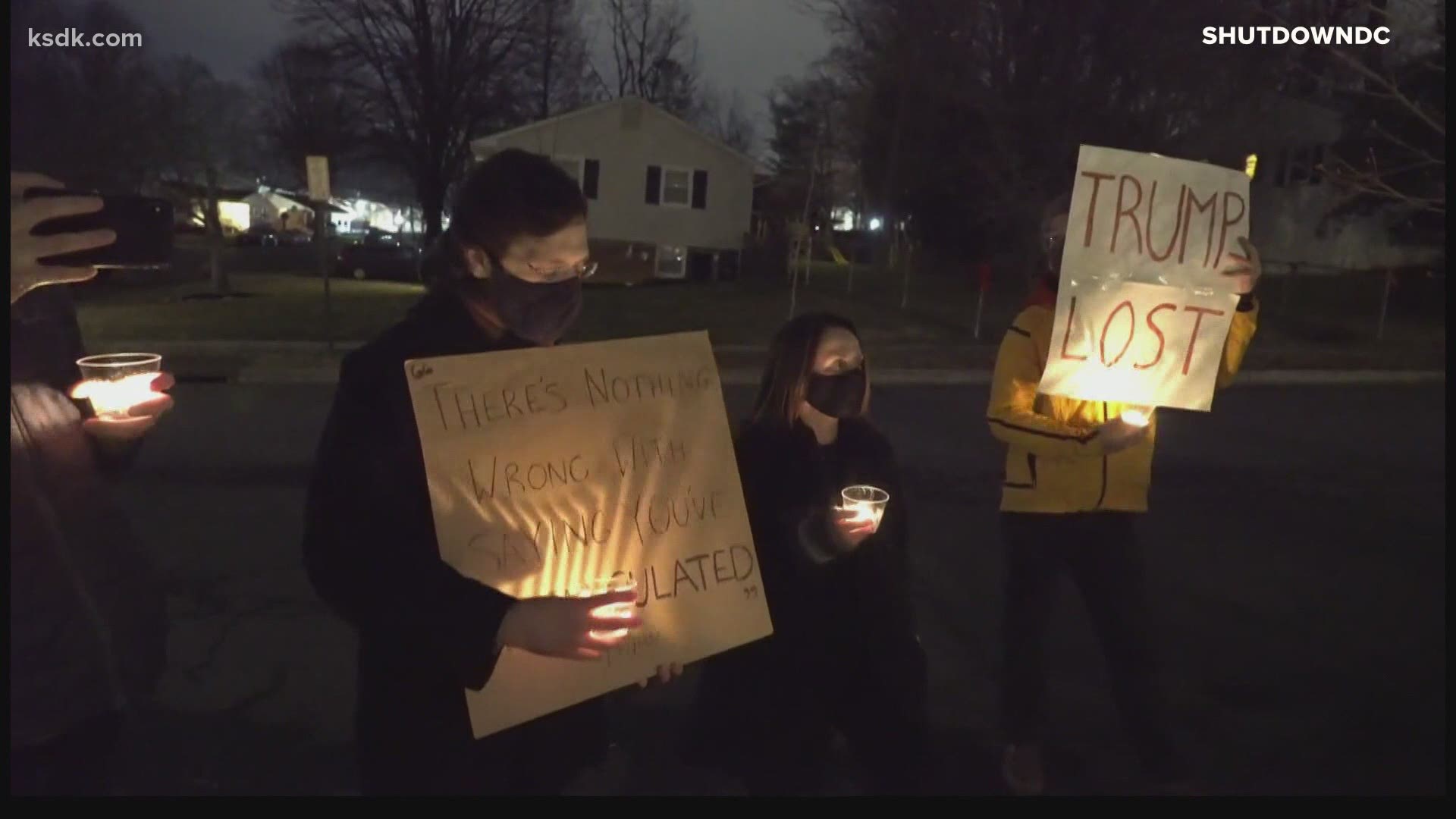 The senator from Missouri said his wife and newborn were inside while protesters gathered outside their home in Virginia. Organizers called it a candlelight vigil