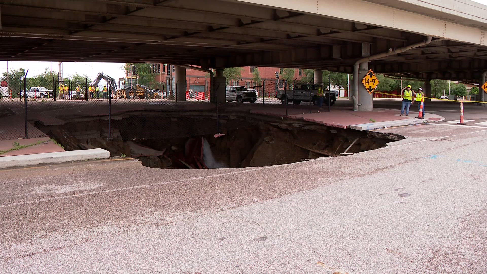Giant sinkhole opens downtown, closes roads near I-44 and I-70