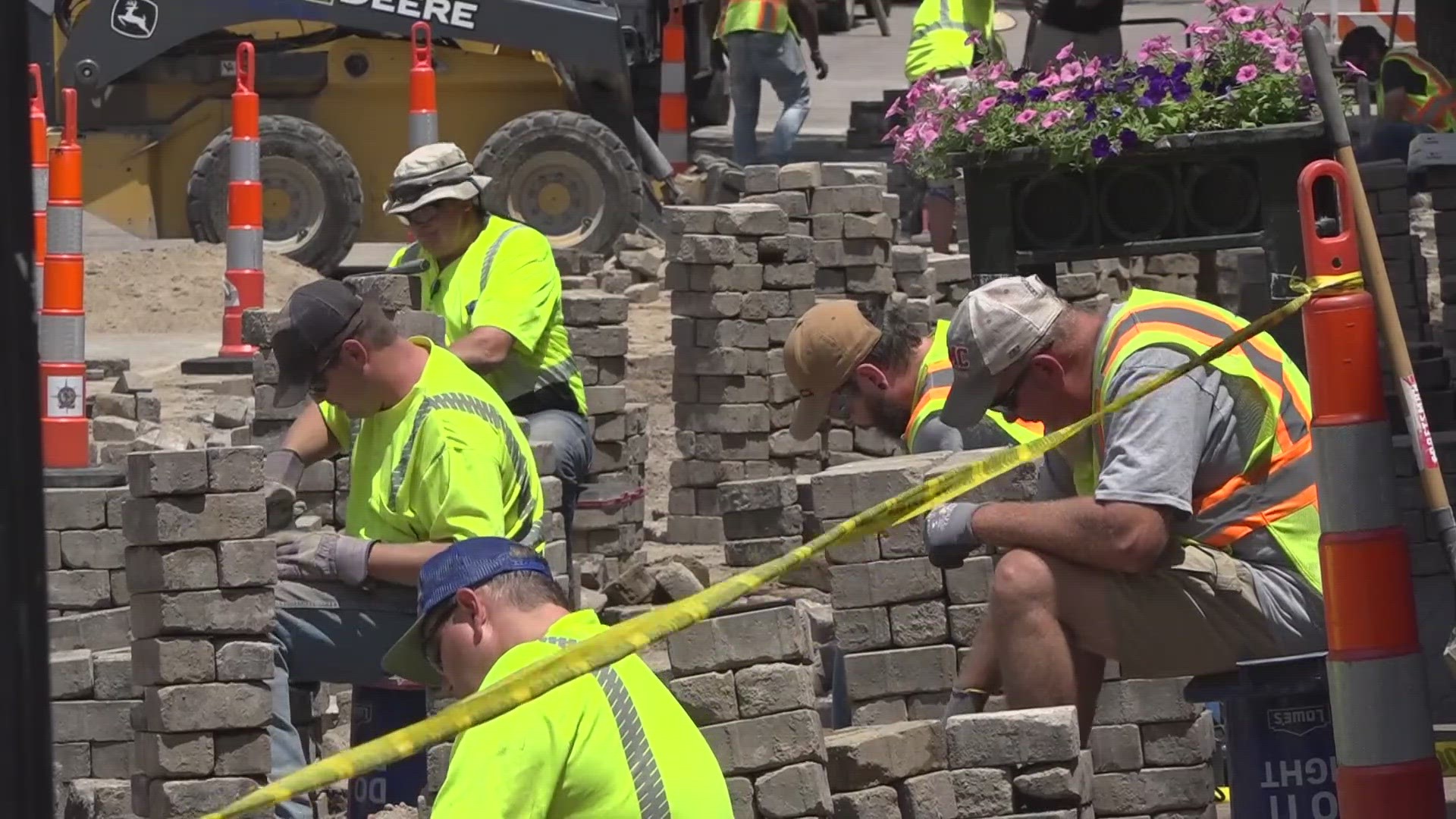 About 250 feet of bricks were displaced after a water main break on the north stretch of Historic Main Street. Work is underway to put them back where they belong.