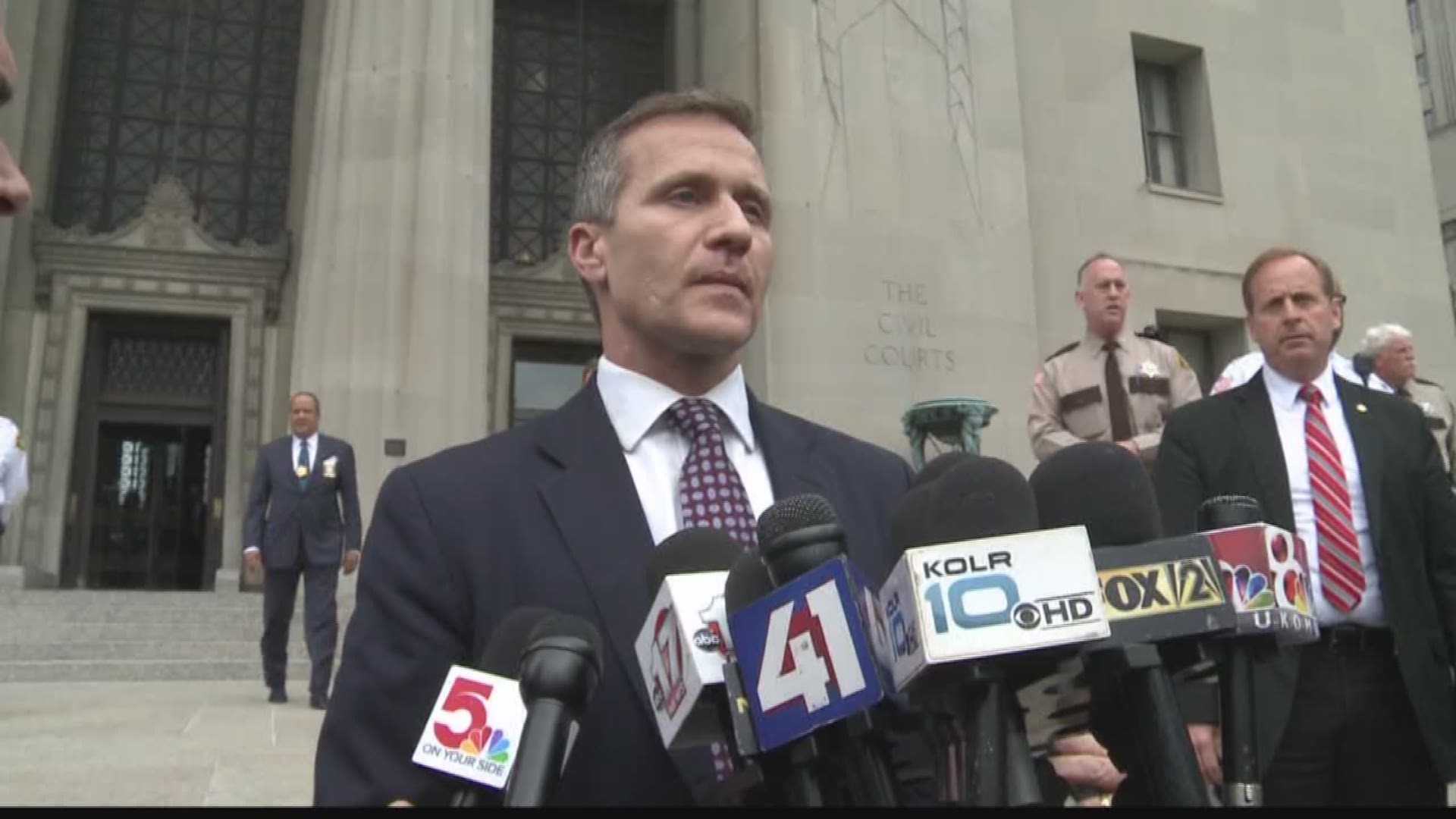 Governor Eric Greitens walked out of court with his felony invasion of privacy charge dropped.