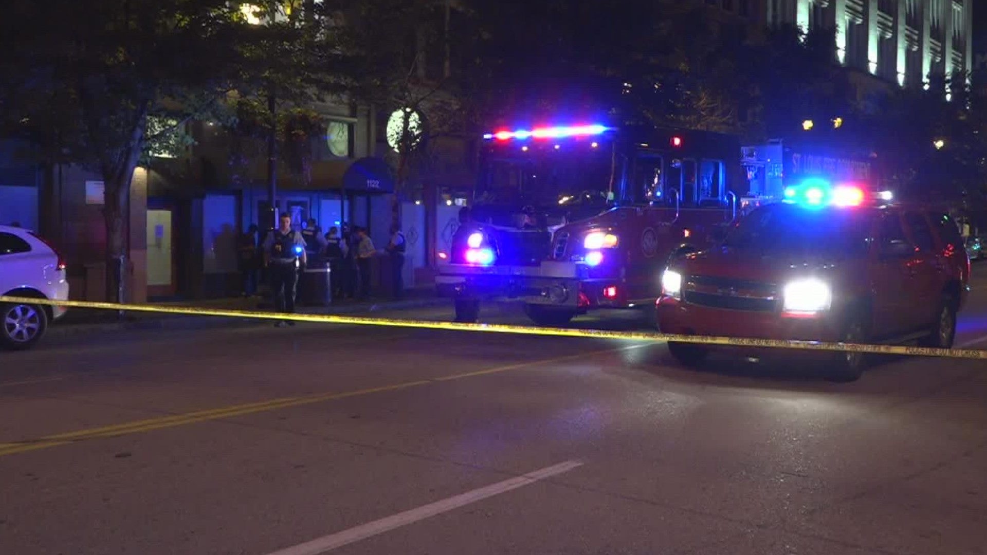 Two people, including a security guard, were rushed to the hospital after being shot in the parking lot of a downtown St. Louis club.