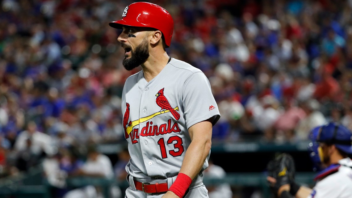 St. Louis Cardinals' Matt Carpenter (13) shouts out as he walks