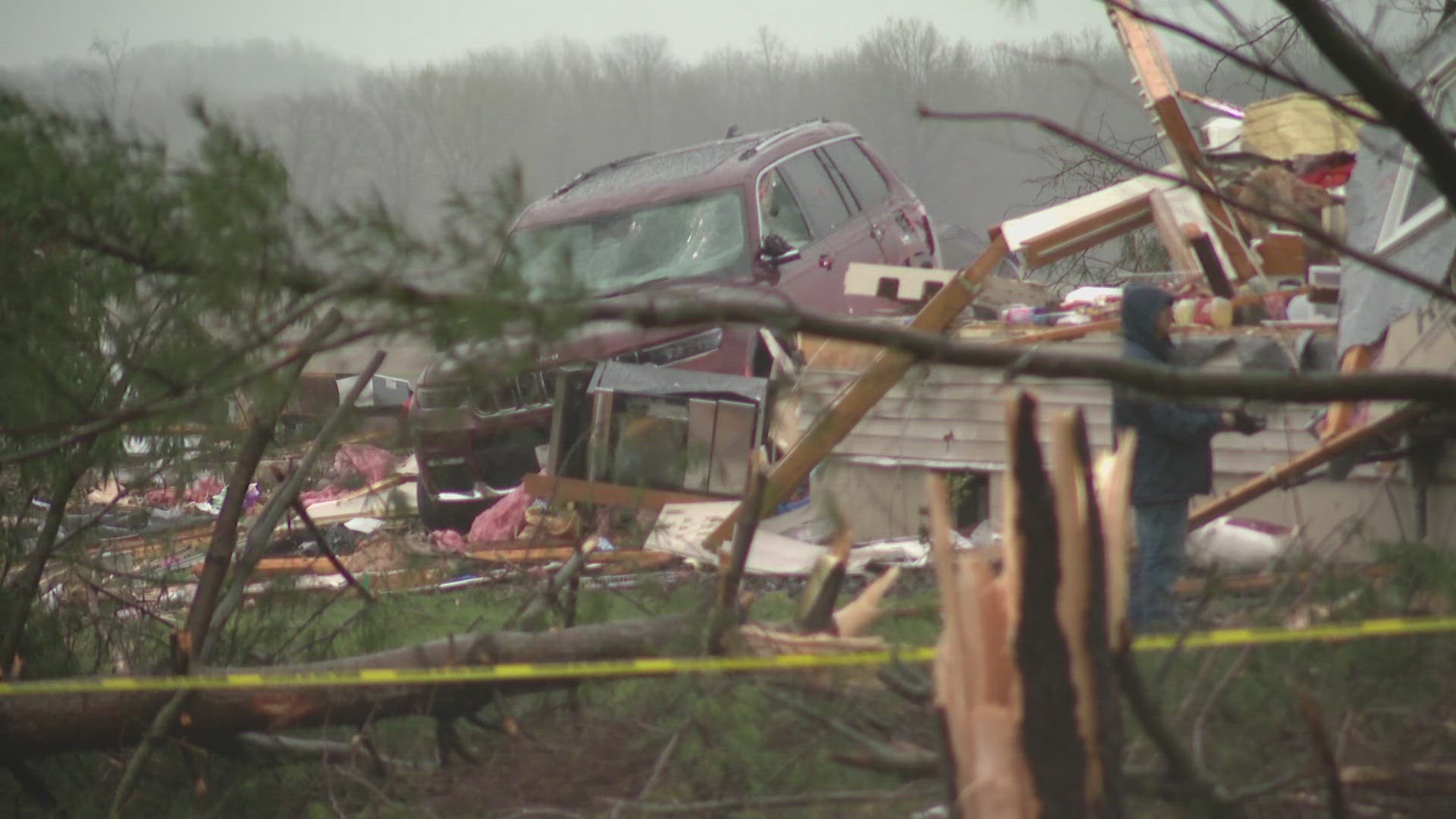 A woman was running to safety in Bond County, Illinois, when storms hit on Wednesday. Moments later, her home crashed to the ground.