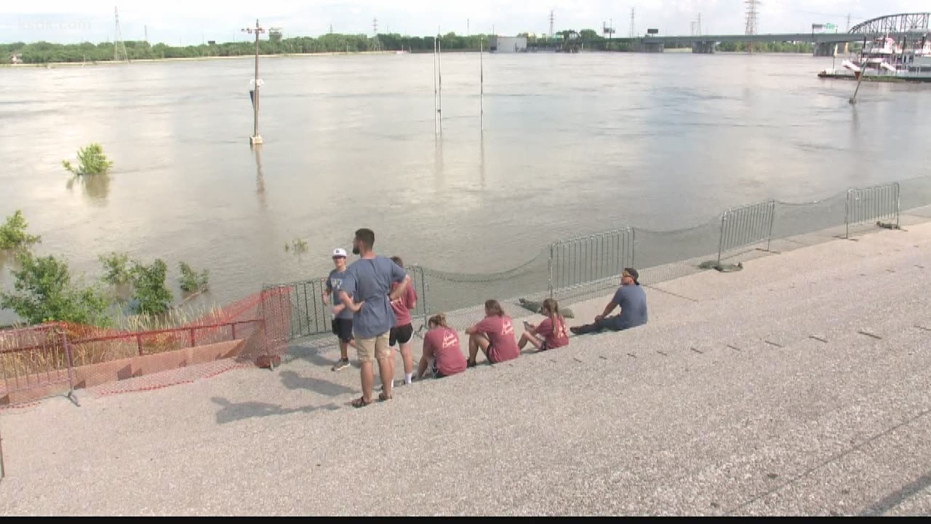 In downtown St. Louis, the Mississippi River crested last night. And the flood has become an attraction of its own.
