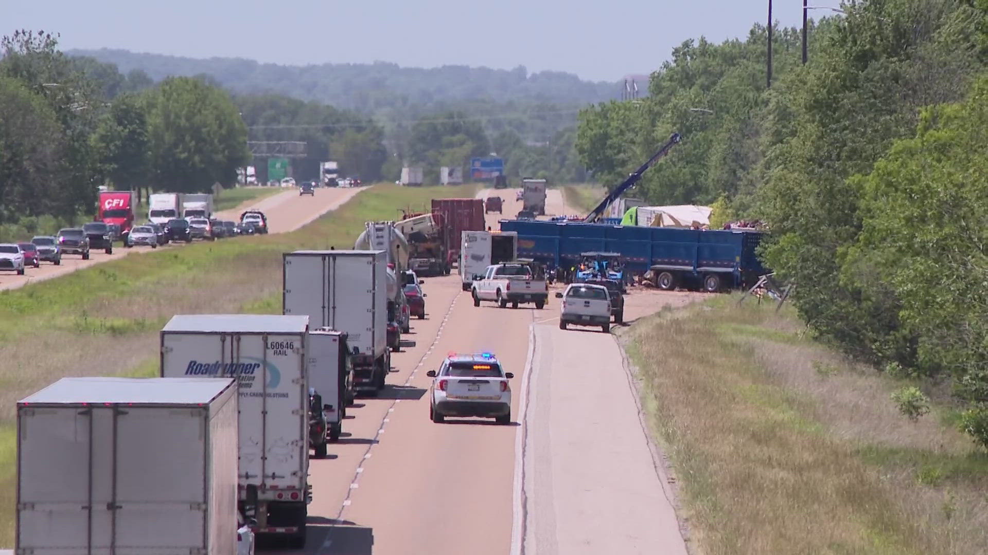 Two semi-trucks are lying in pieces on Interstate 64 after a crash near New Baden. Two people were injured.