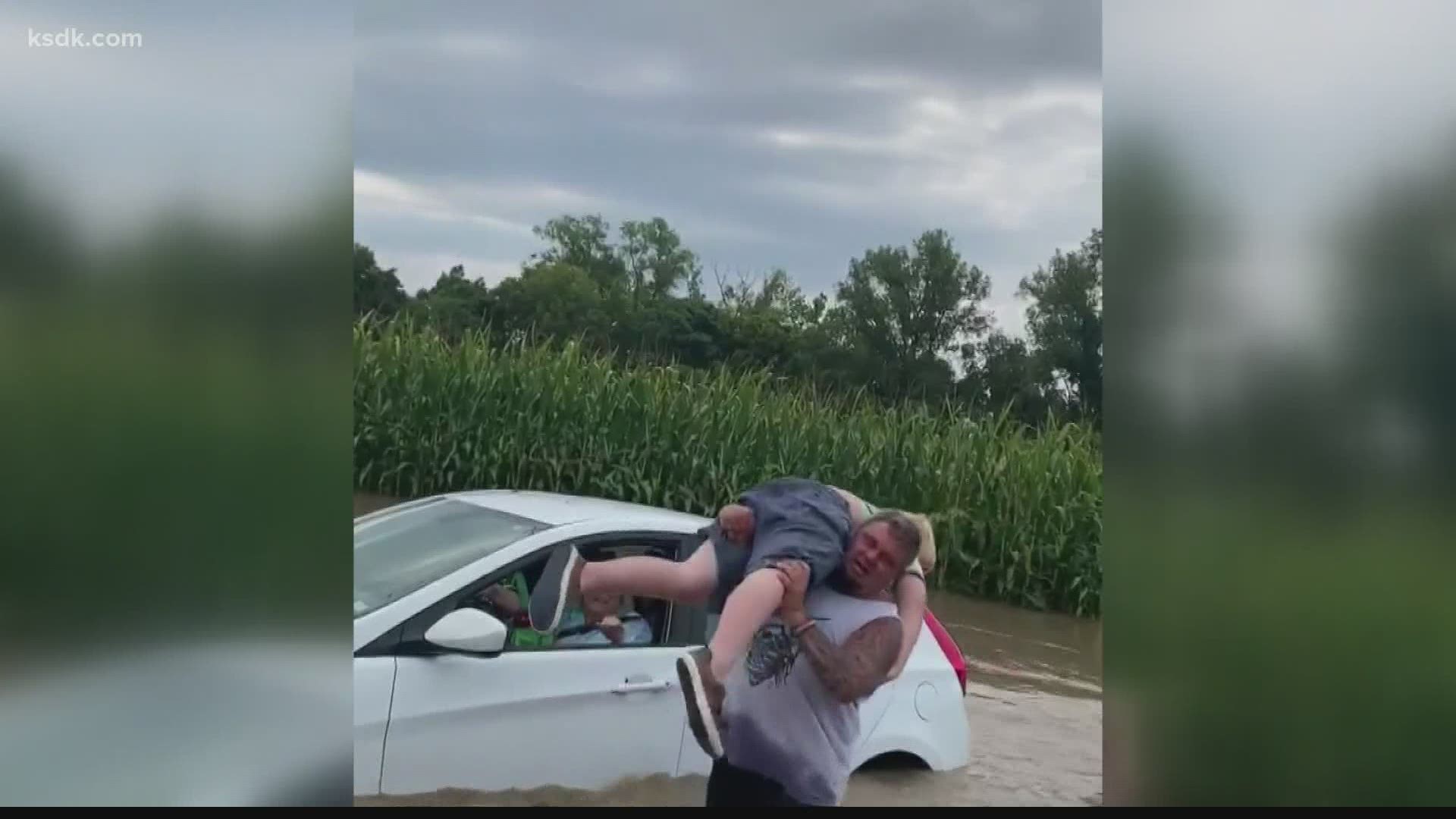 The three got stuck in flash flood waters on Sunday along Highway 162