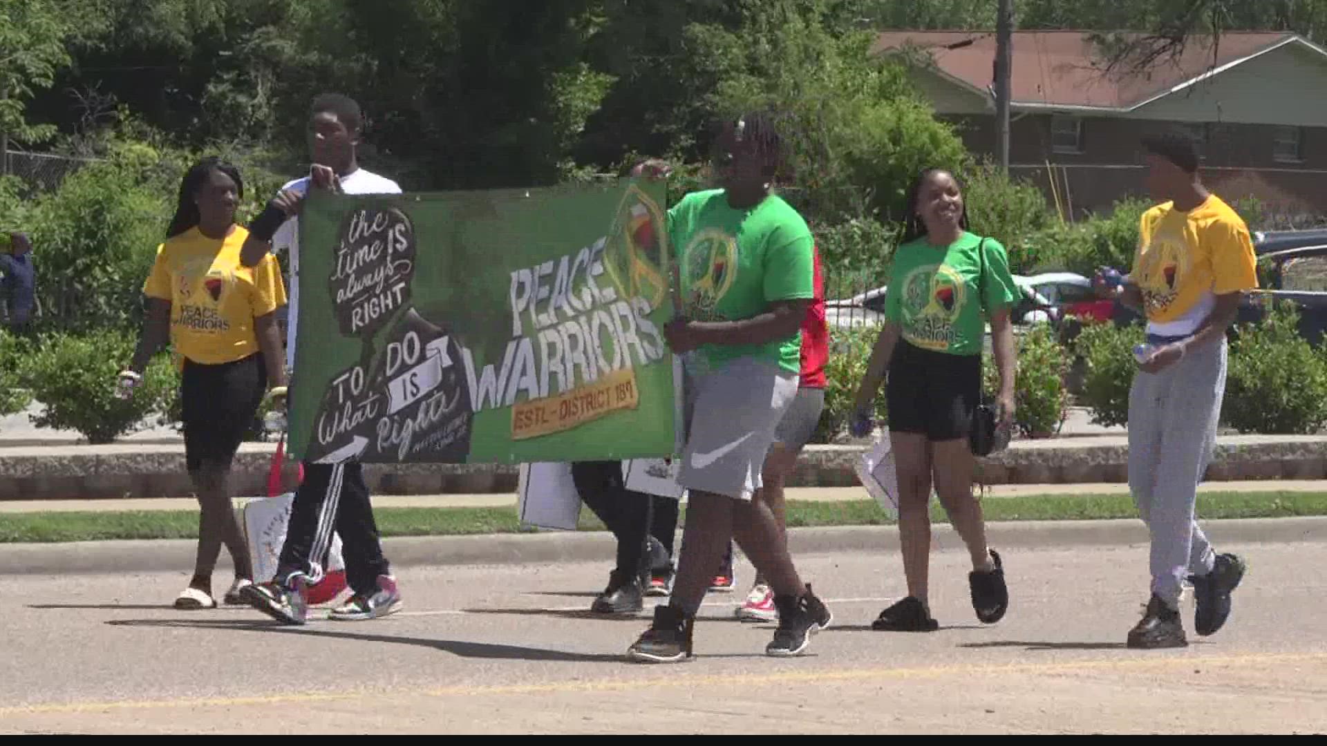 Members of the East St. Louis community came together Saturday to bring an end to violence against youth in the city with a parade and rally.