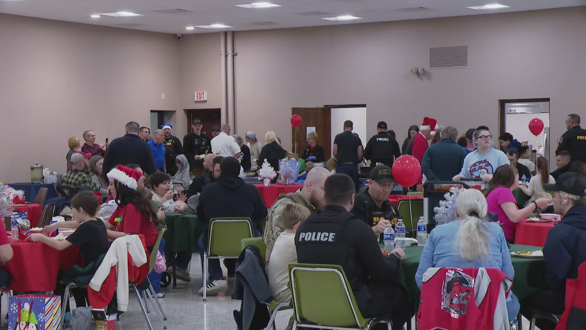 Granite City police officers and firefighters helped cross off some local kids' Christmas lists Sunday. They gave the kids $250 Walmart gift cards