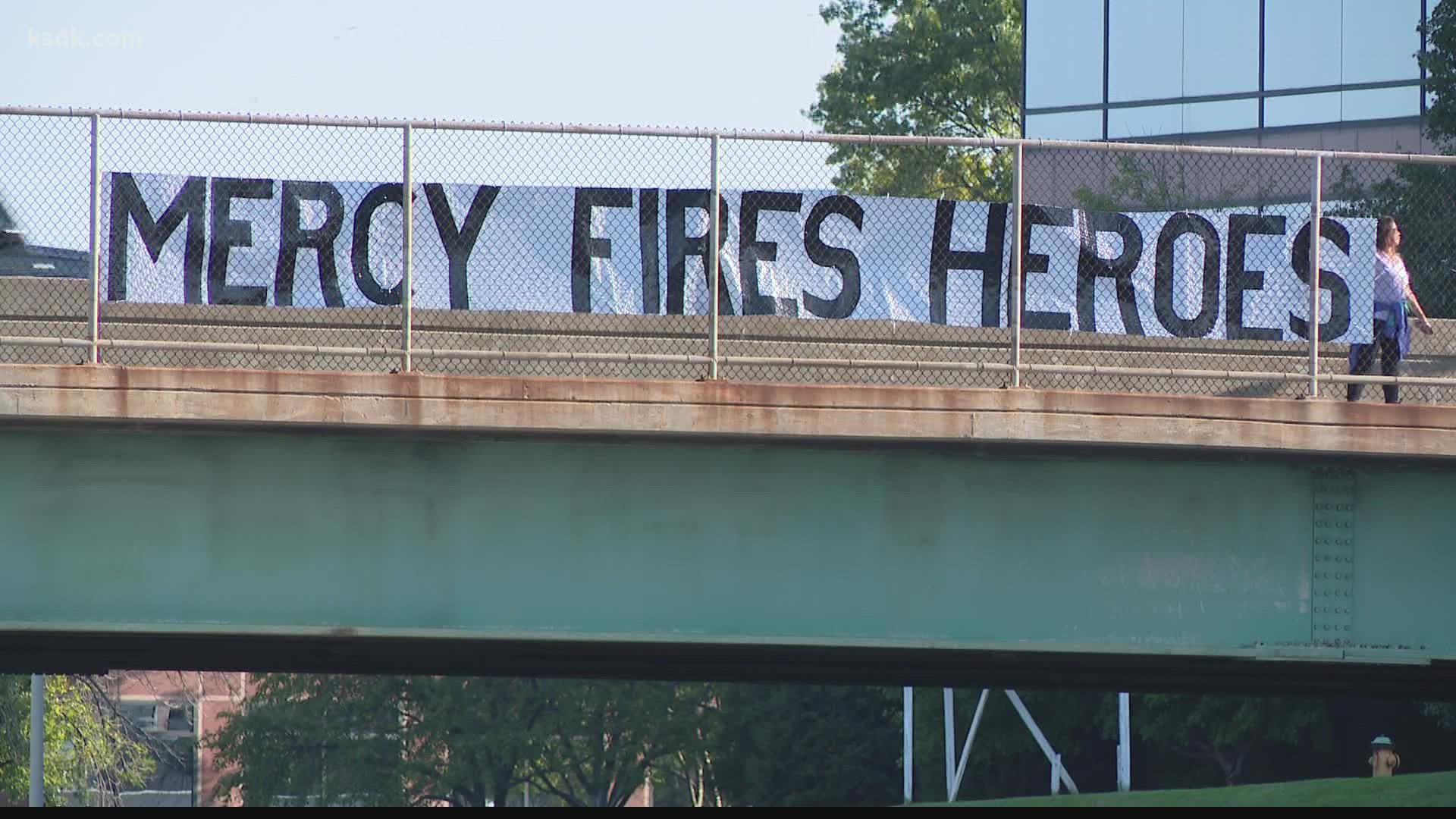 A large signed grabbed the attention of drivers along a busy stretch of highway in west St. Louis County.