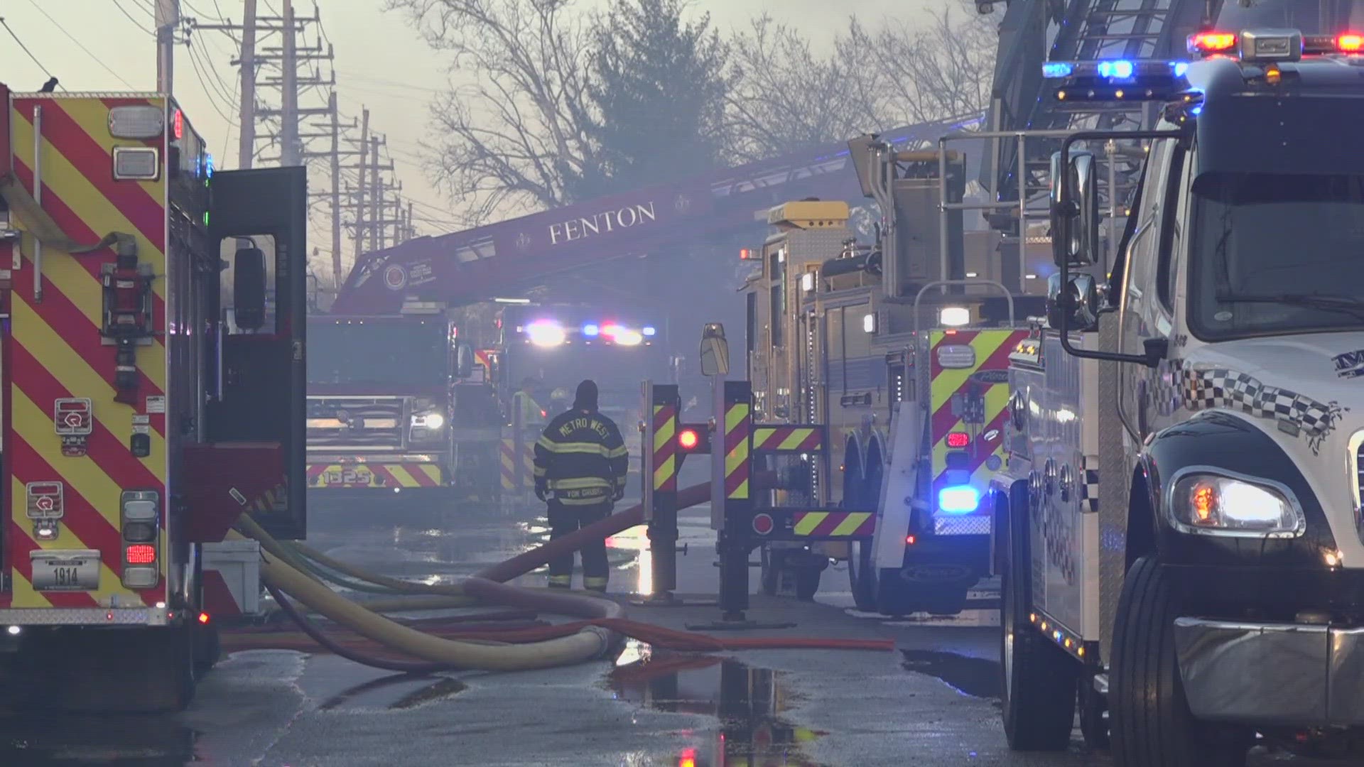 Waves of thick smoke coming from the building made it difficult to see and breathe.