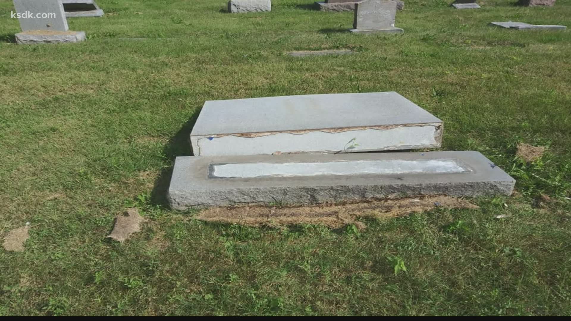 About 200 headstones were knocked to the ground