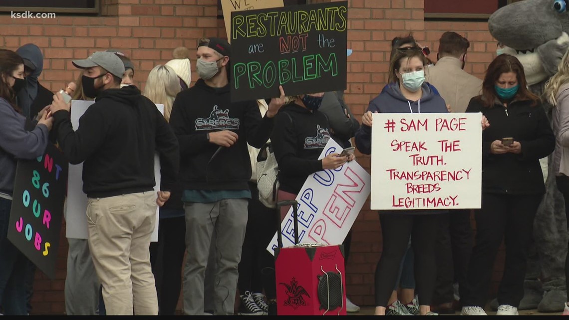 Dozens protest restaurant restrictions outside St. Louis County Executive Sam Page&#39;s office ...