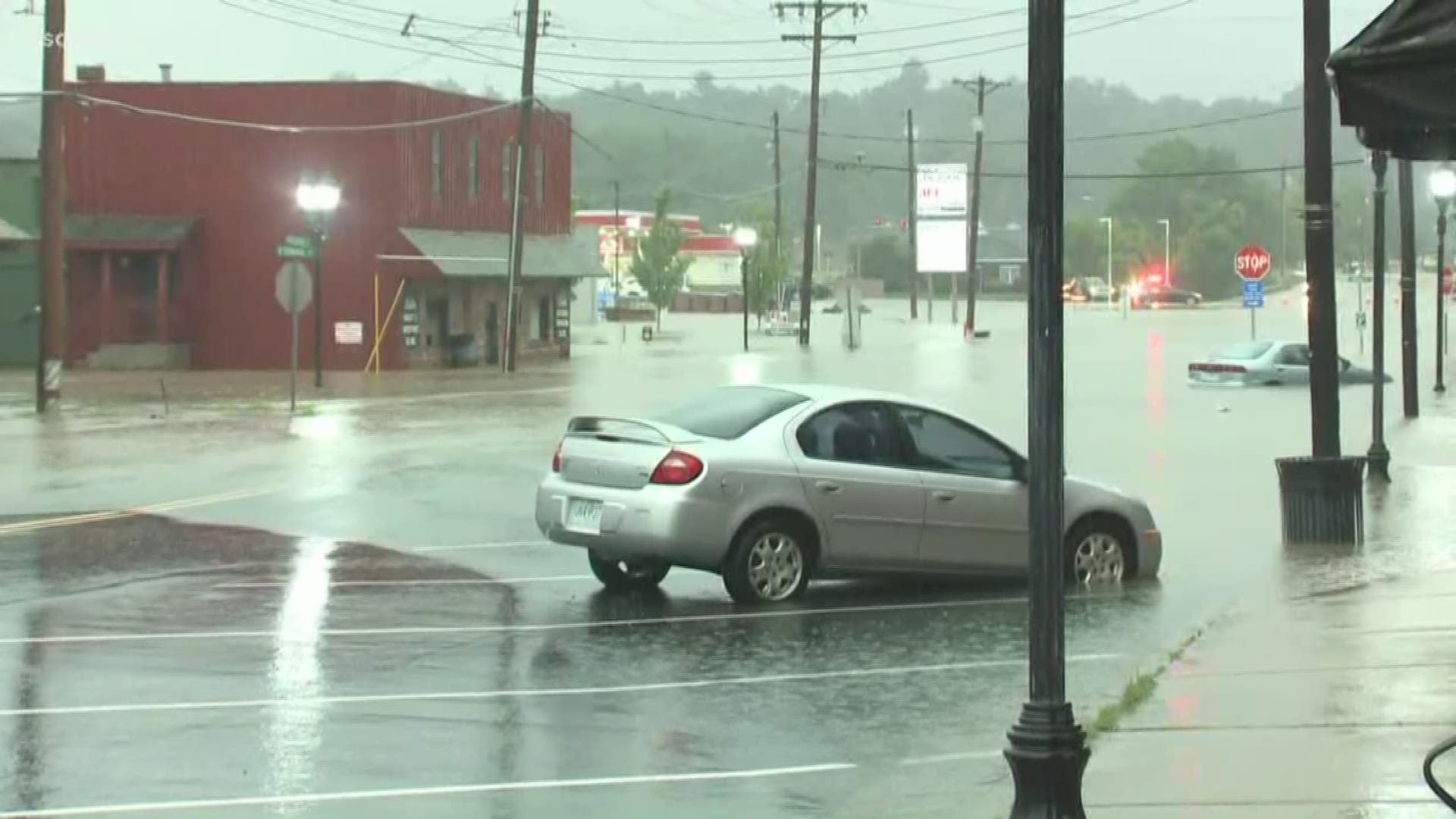 Several roads look like rivers in Eureka, Missouri, after heavy rain pushed through the area early Monday morning. The view from 5 On Your Side's Rhyan Henson showed at least two cars in deep water. The water is almost up to the bottom of the window of one of the cars.