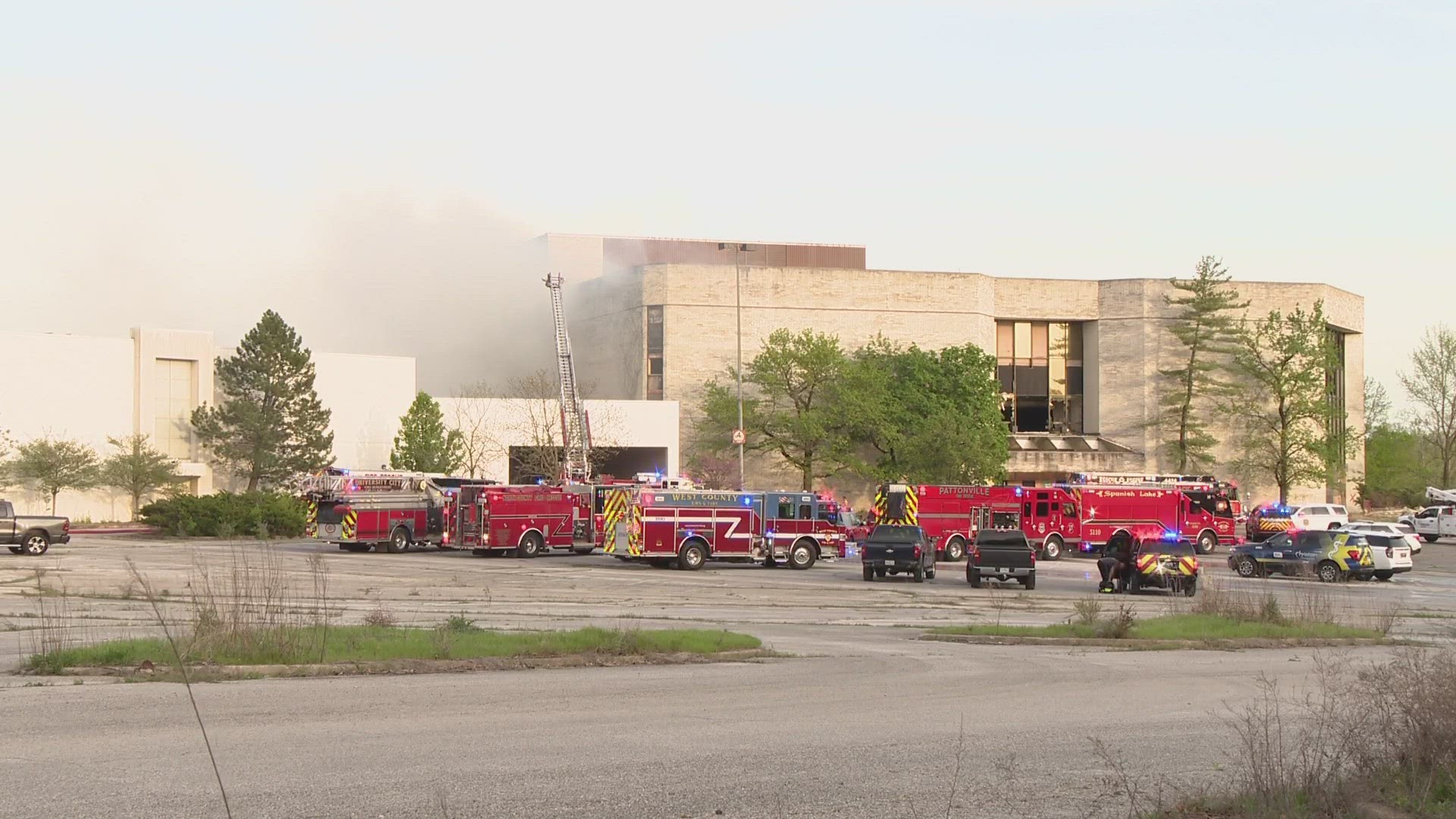 The fire broke out 6 p.m. Wednesday at the abandoned shopping complex on North Lindbergh. Two firefighters were hospitalized with non-life-threatening injuries.