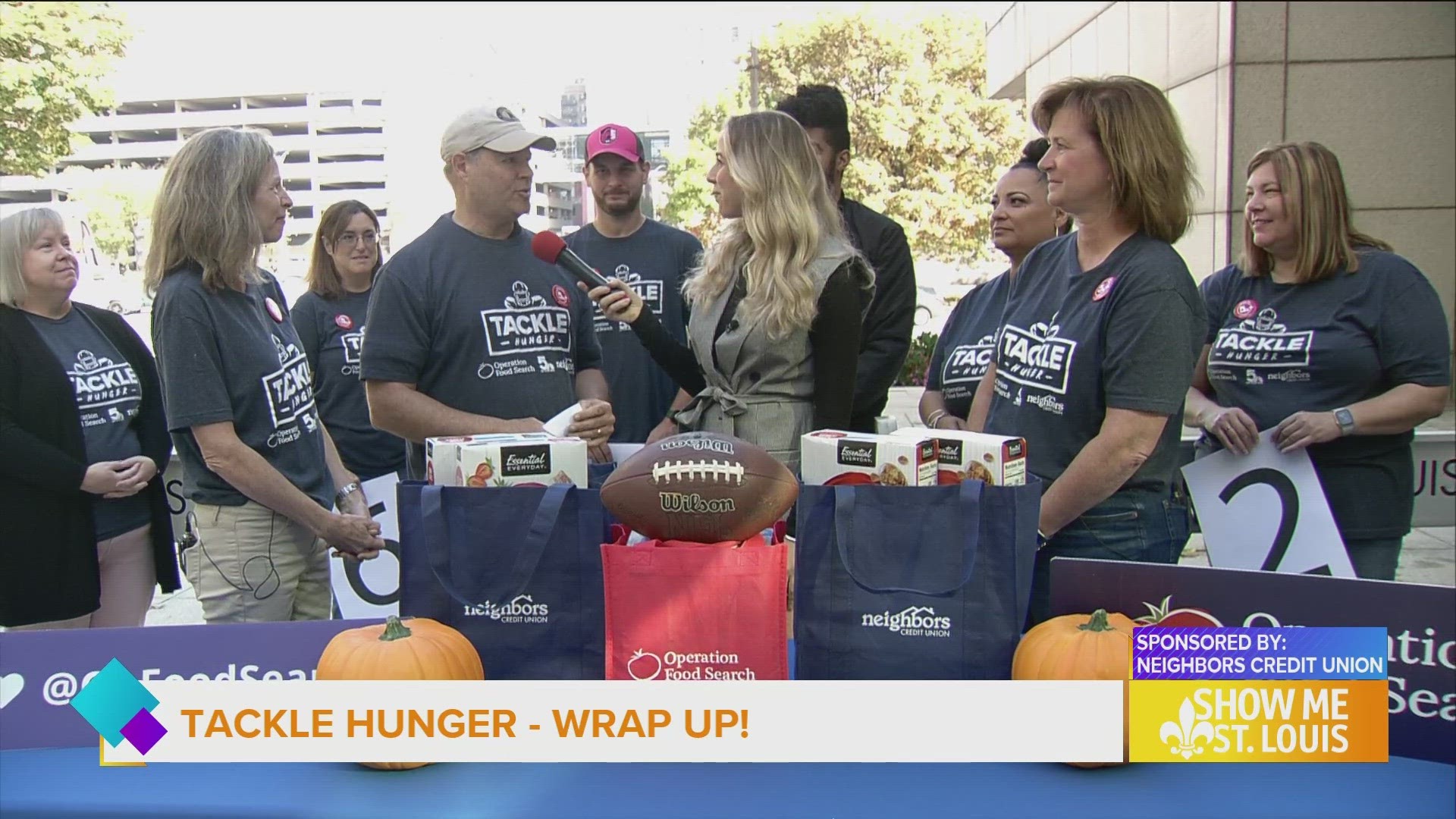 Neighbors Credit Union and Operation Food Search stopped by Television Plaza to wrap up this year's Tackle Hunger campaign.