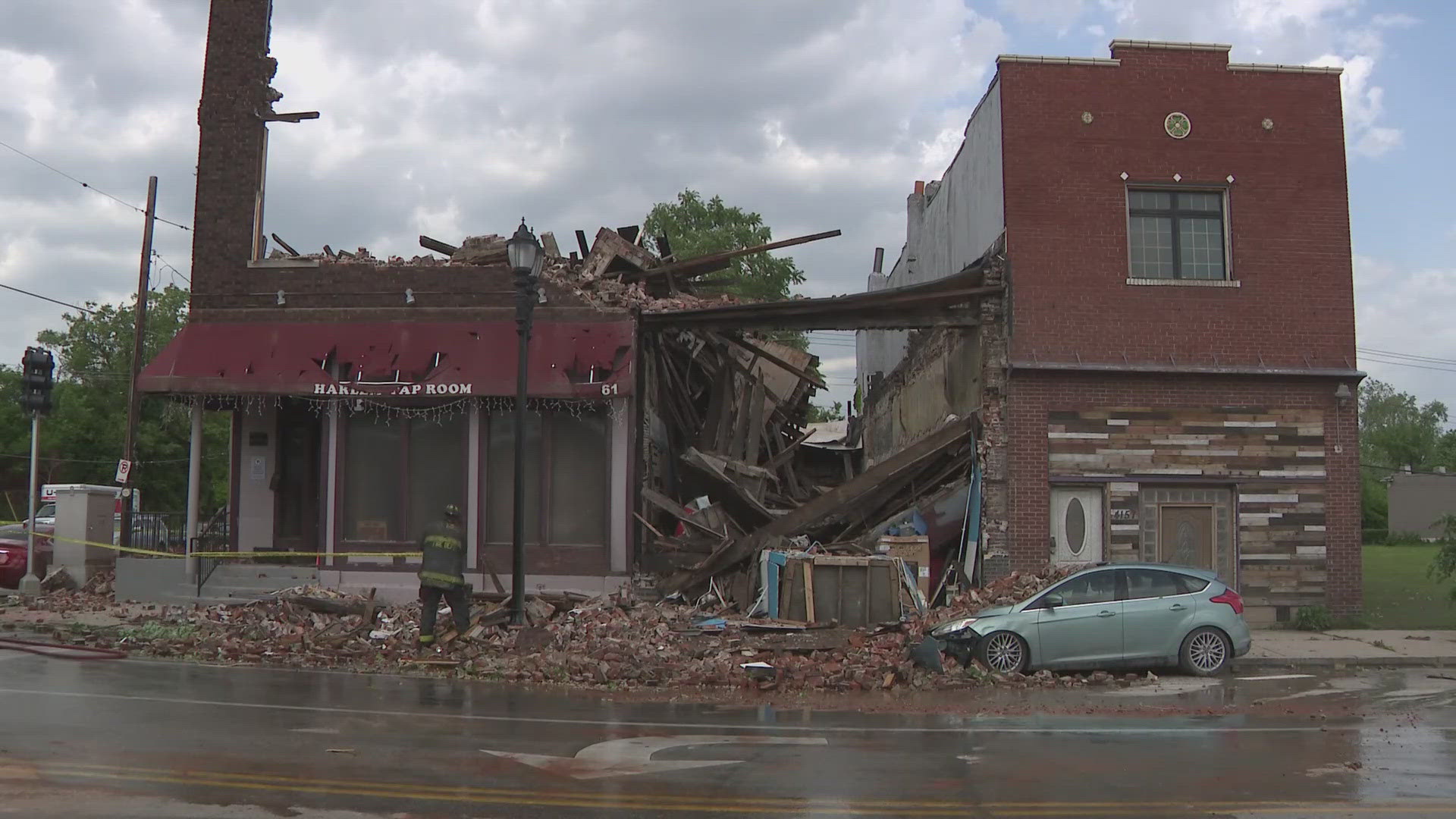 After a tornado touched down in St. Louis Friday, the storm sent bricks flying at Harlem Tap Room. Patrons said they had moments to run for cover.
