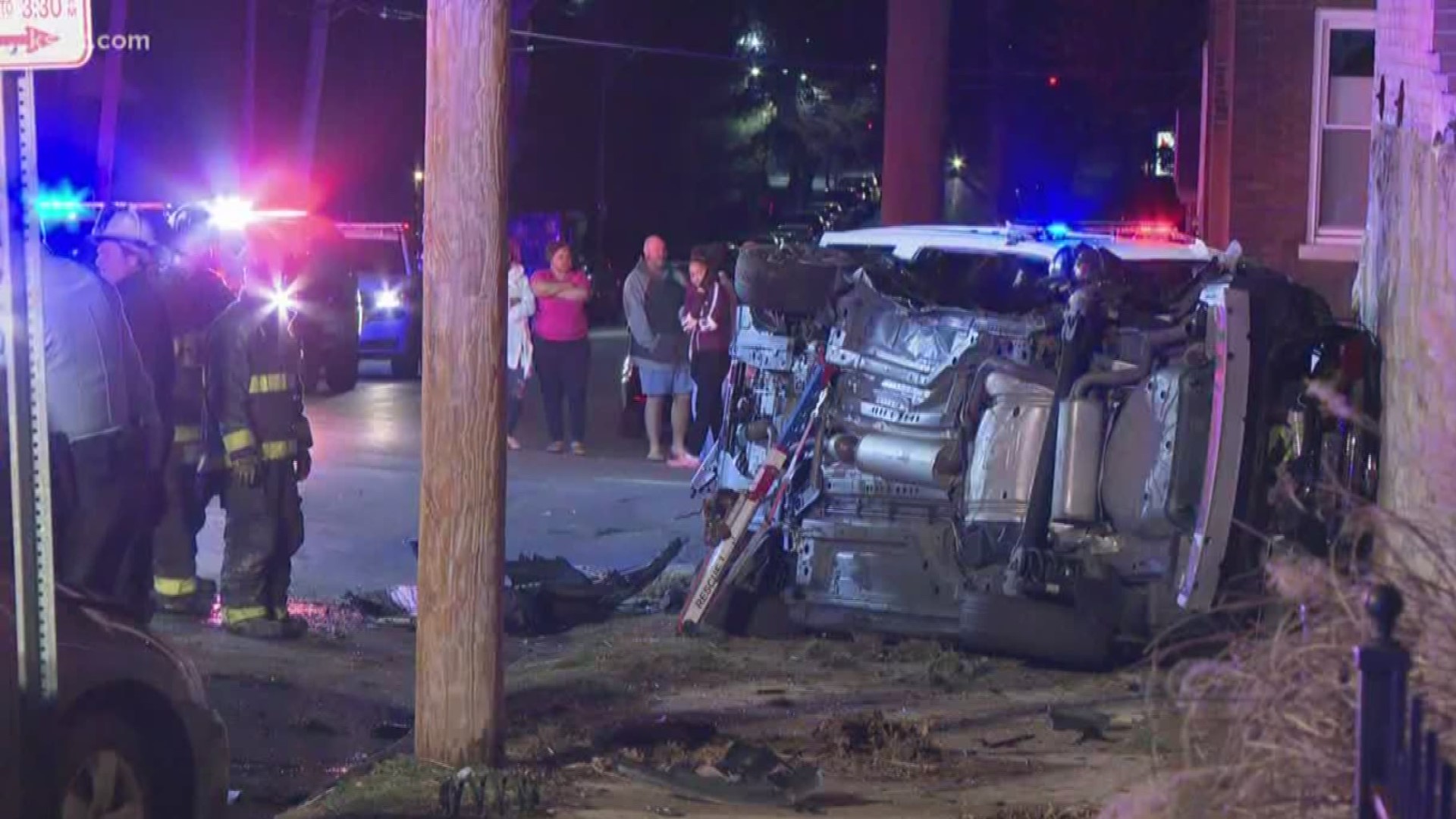 Several parked cars were struck in the two-car crash late Sunday night.