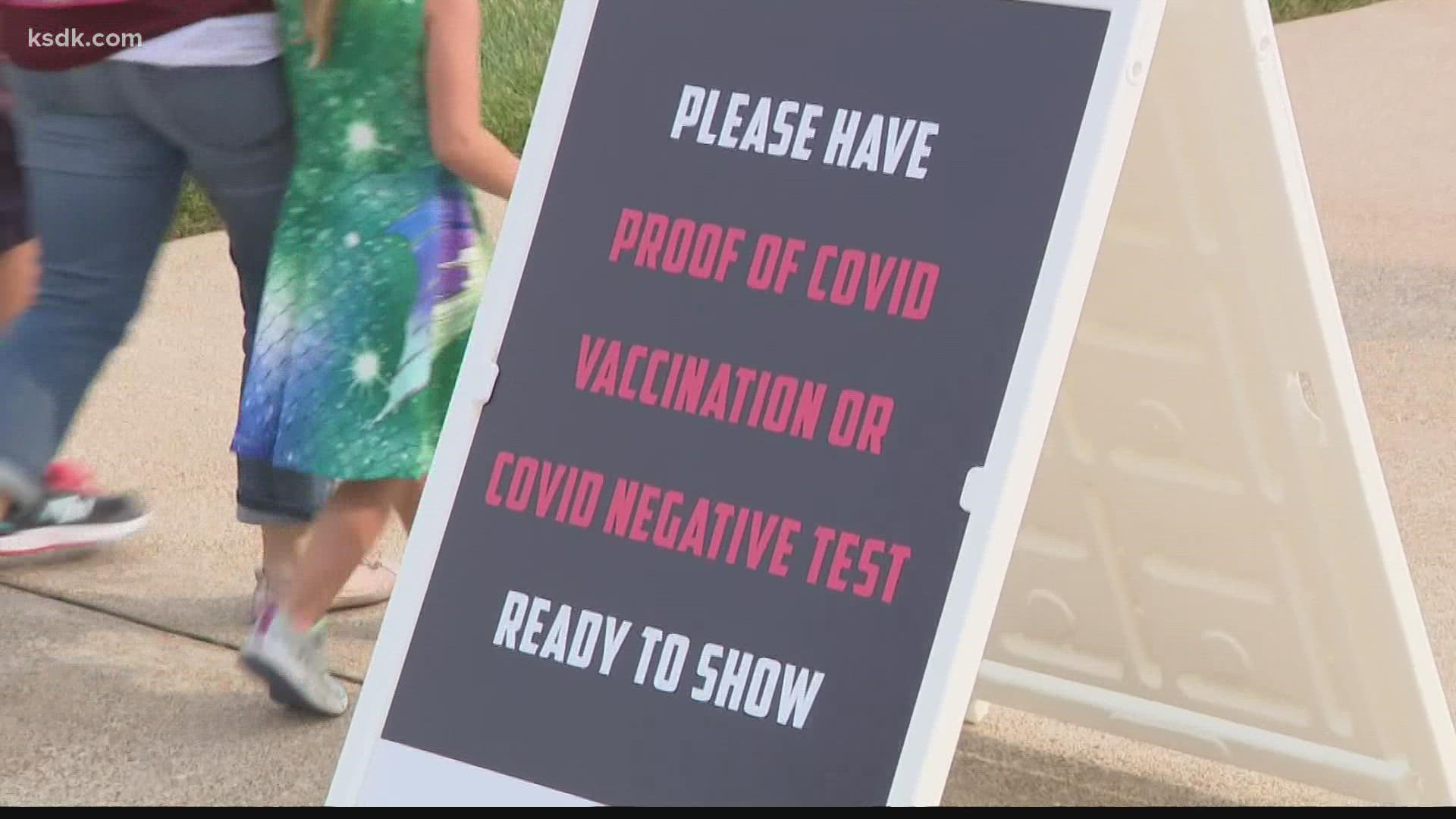 For people who didn't know about the requirements, organizers had small flyers that directed them to pop-up tents where medical crews were administering rapid tests