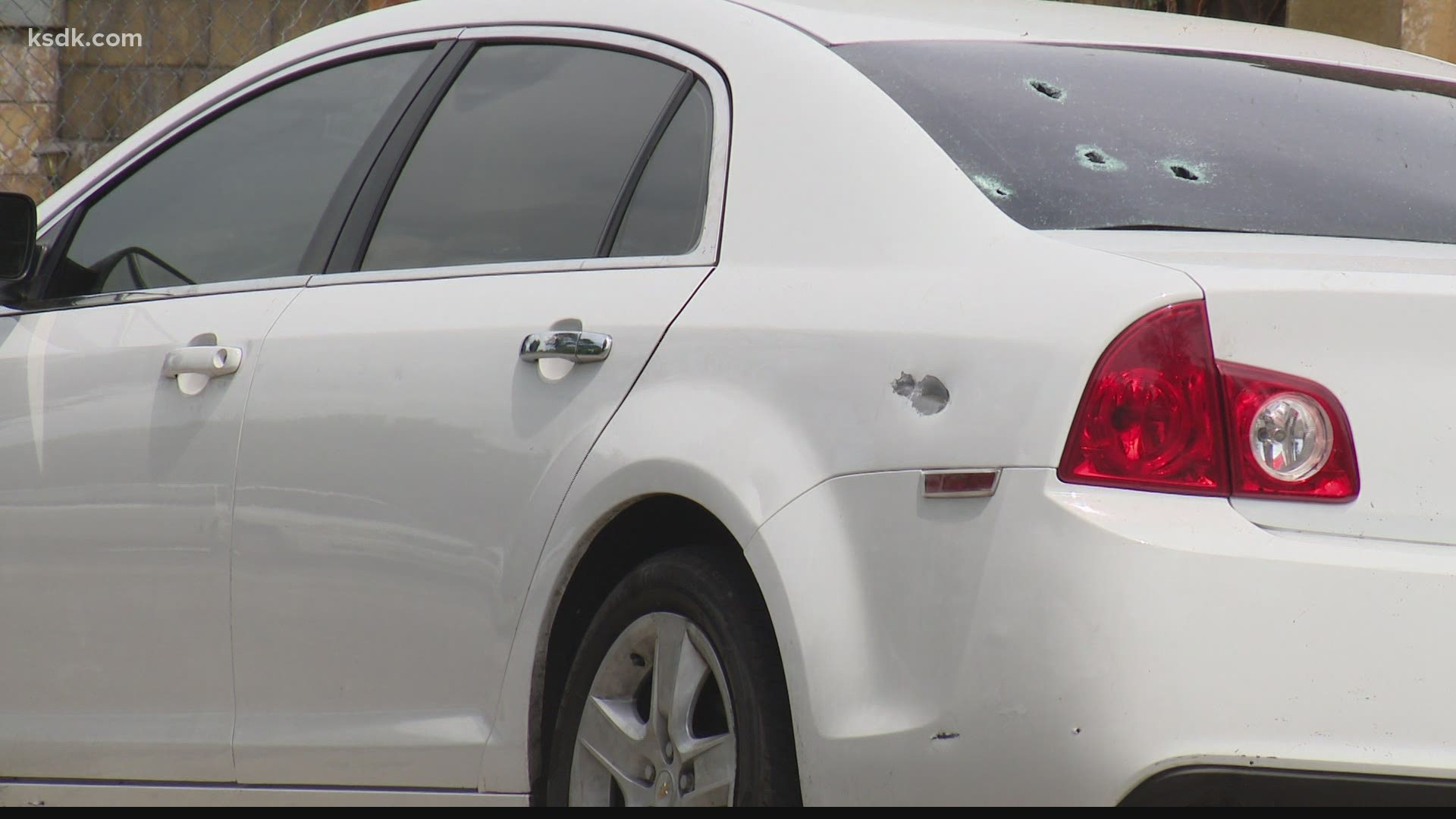 A car containing several children is hit with gunfire, but boy is the only injured.