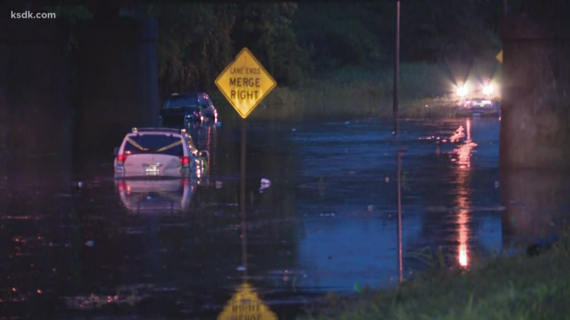 Flash flooding is covering streets, leading to submerged cars and water rescues early Monday morning. This is along Riverview Drive at Hall Street in north St. Louis.