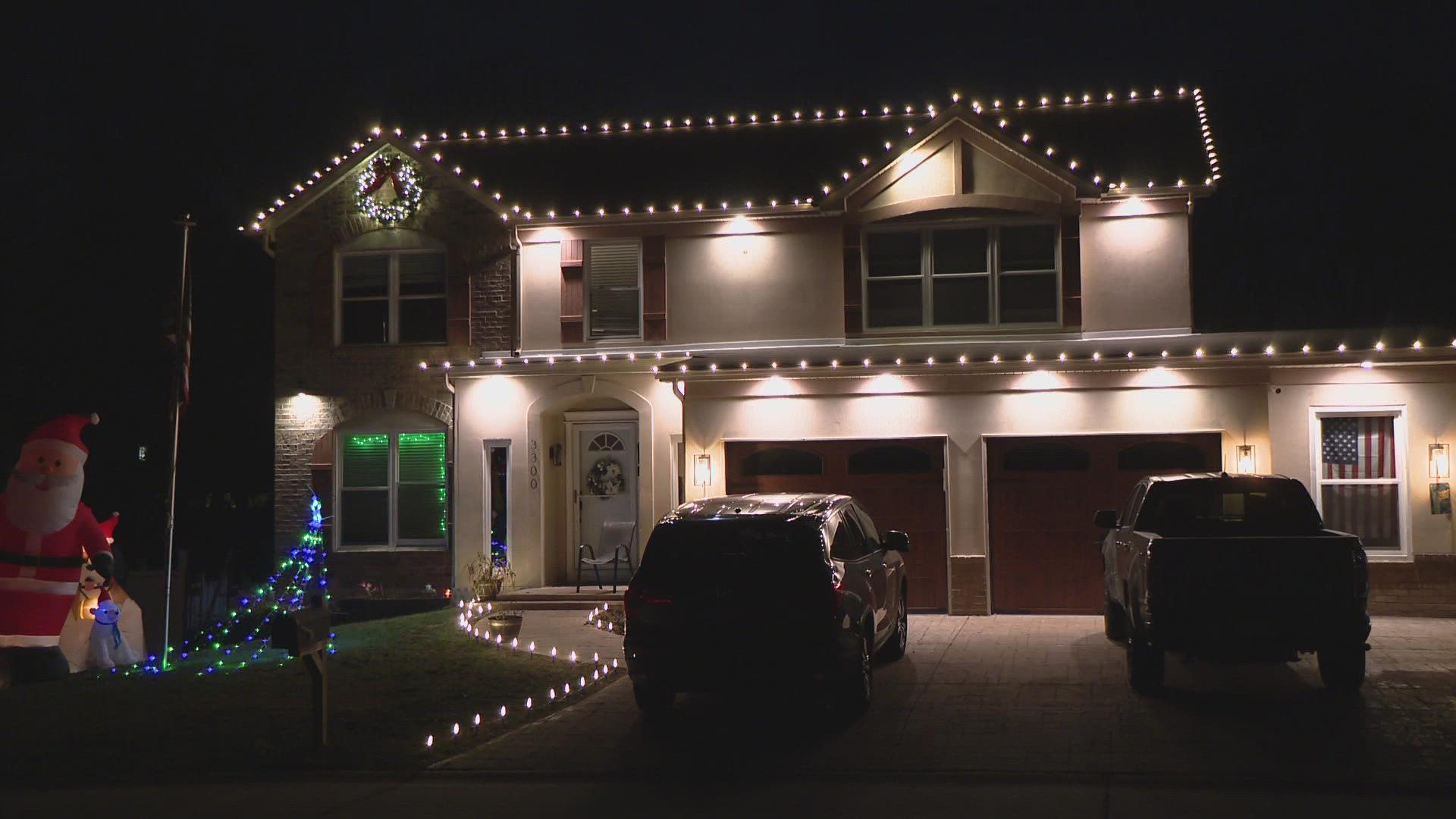 The team from St. Louis Christmas Decor put lights on veteran Todd O'Neal's home.