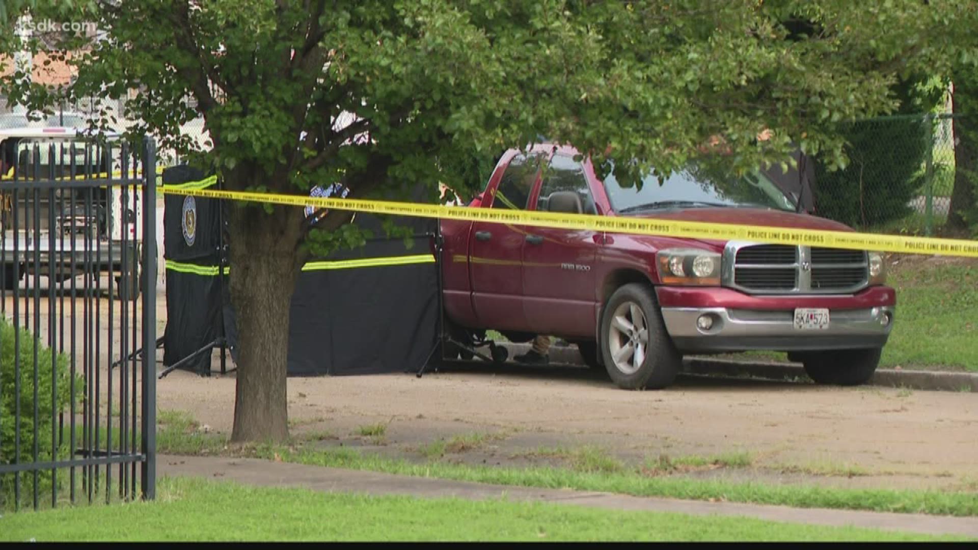 St. Louis police say 62-year-old Mark Kuhlenberg and 41-year-old Toni Washburn were found shot to death in the bed of a burgundy pickup truck.