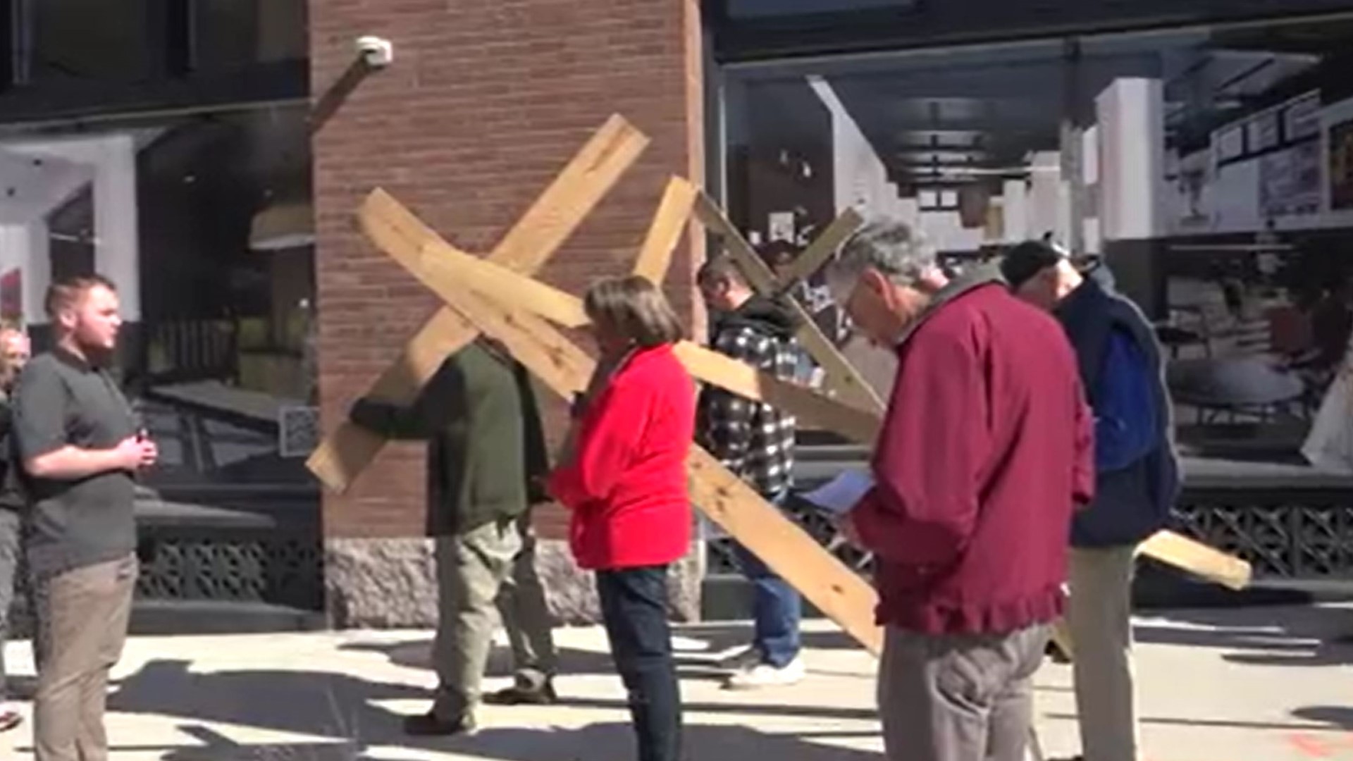 A group of people carried large crosses across downtown St. Louis on Good Friday. They remembered those who have tragically died in downtown St. Louis.