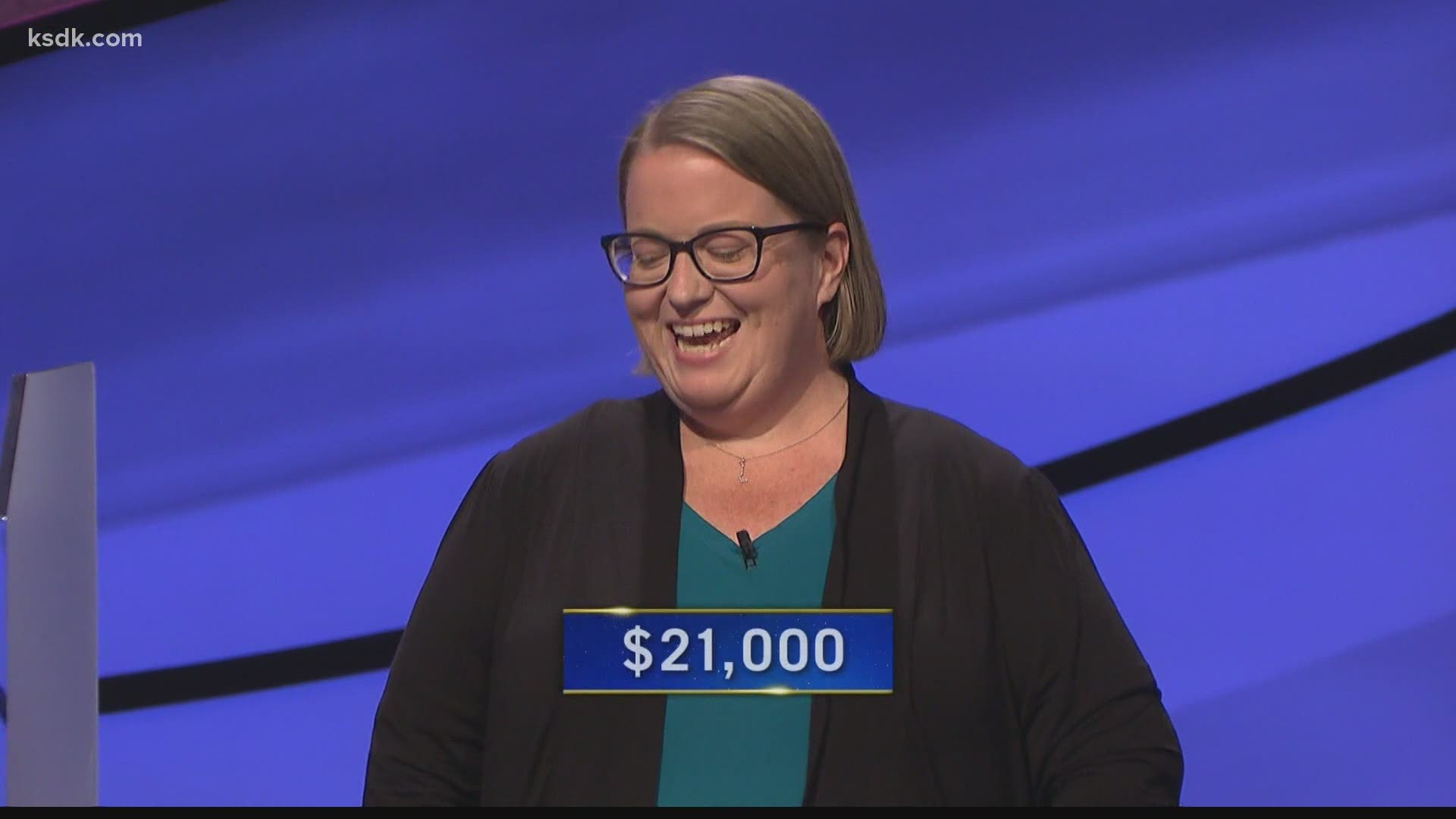 Lindbergh High School teacher Sandy Olive claimed $21,000 in her "Jeopardy!" debut Tuesday.