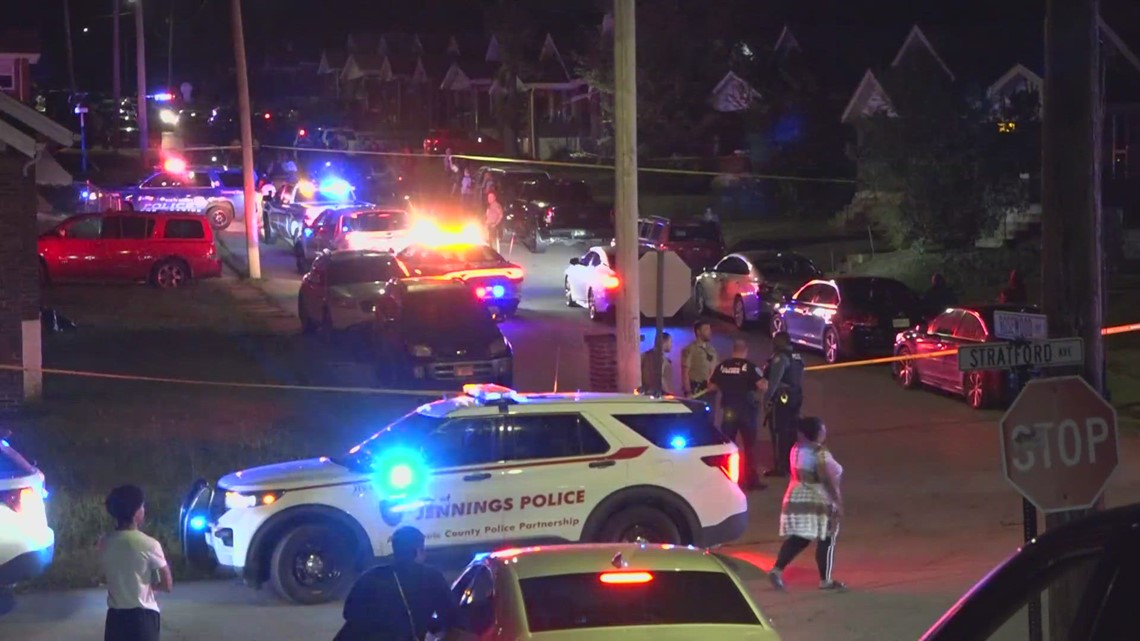 Police hold back crowd at scene of deadly Pine Lawn shooting