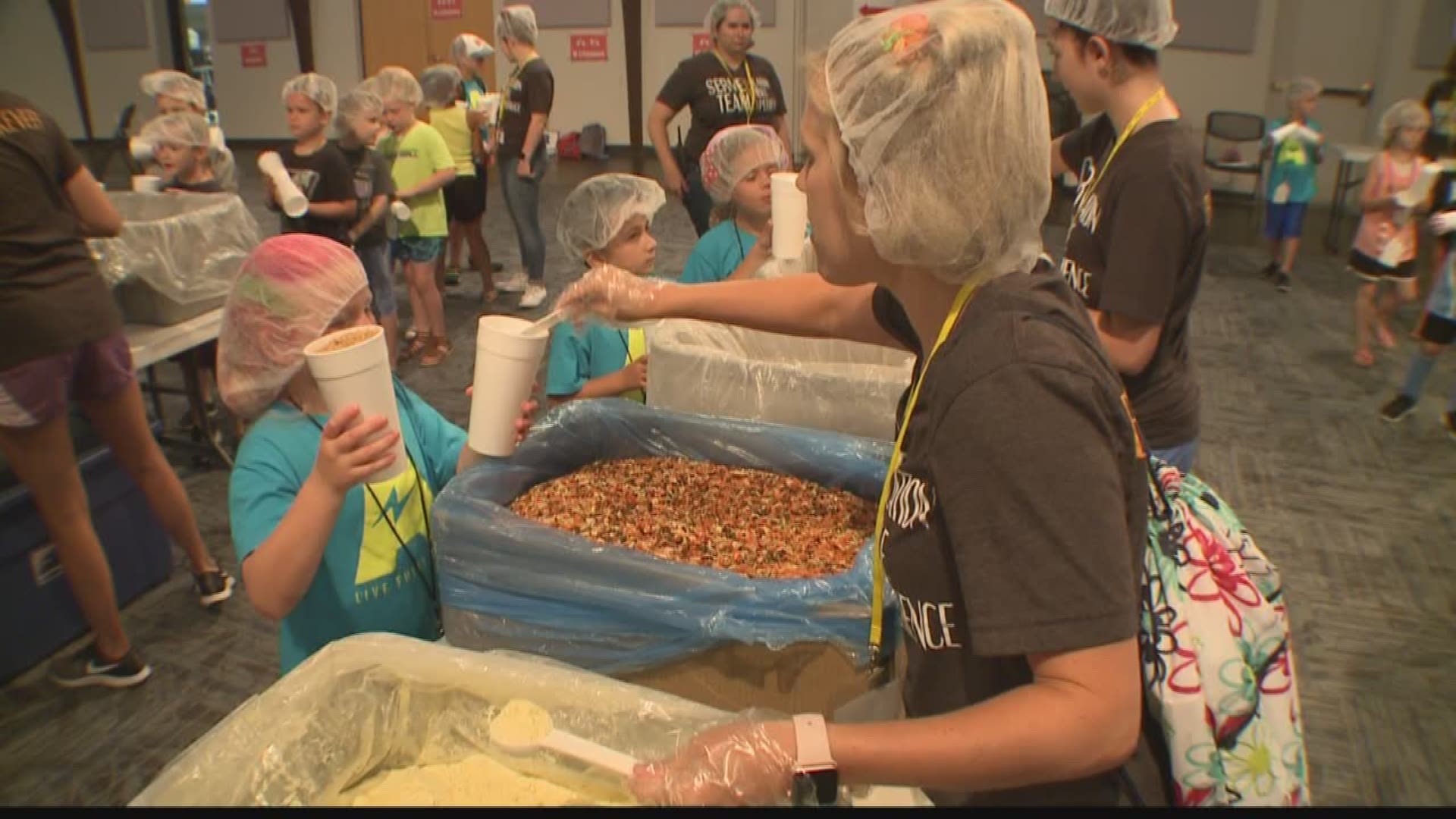 They spent the day packing food for "Kids Against Hunger."