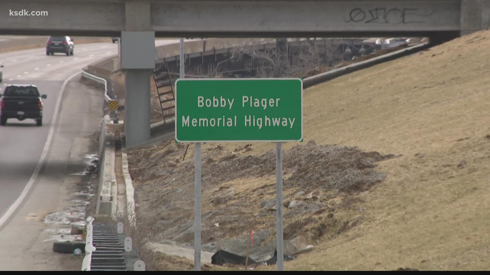 A sign honoring Plager is on the interstate near the 14th street exit.