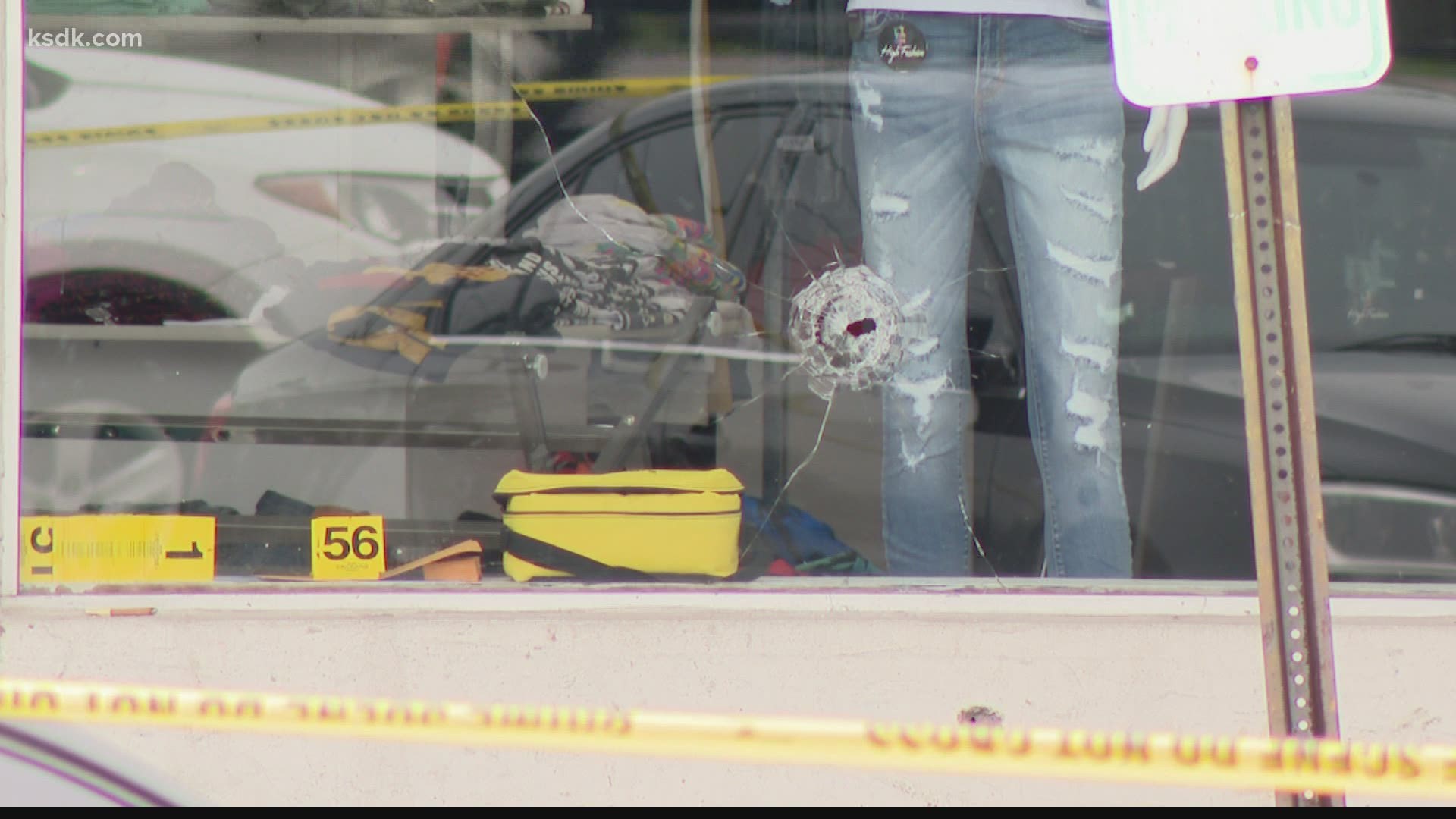 Witnesses says a person inside a clothing store was exchanging gunfire with a person outside