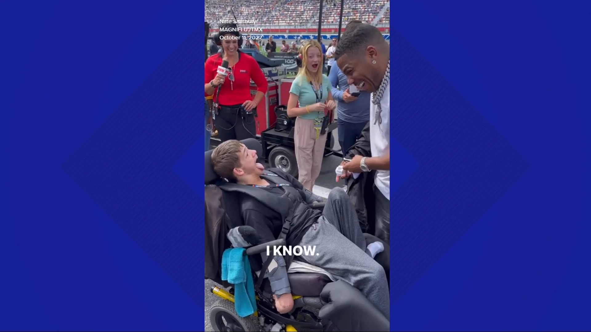 Nelly gives his jacket to a fan at Charlotte Motor Speedway. The you man was born with Lesch-Nyhan Syndrome. This was in October 2022.
