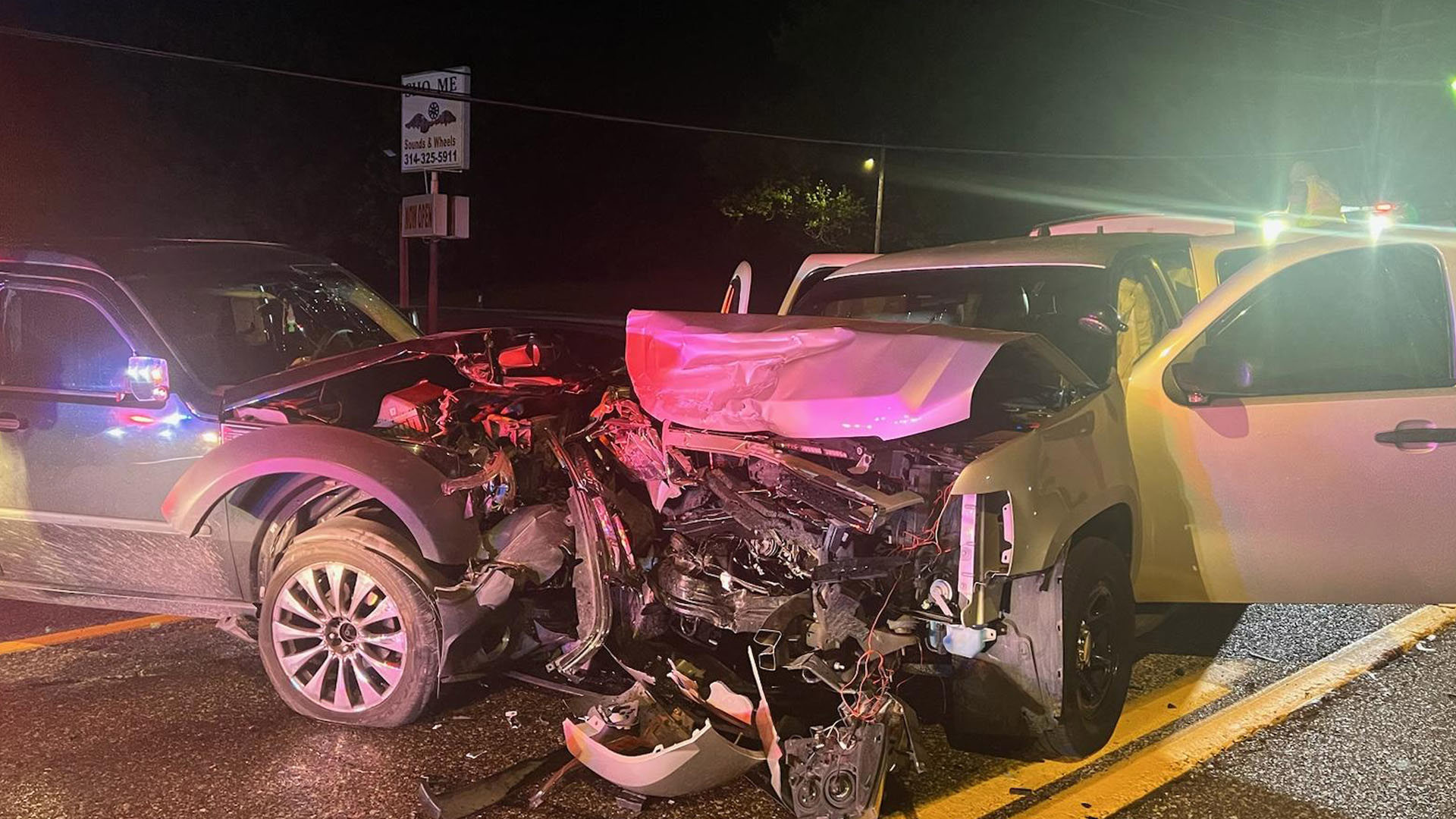 Two officers with the North County Police Cooperative and another driver were injured after colliding head-on. Police released surveillance video of the crash.