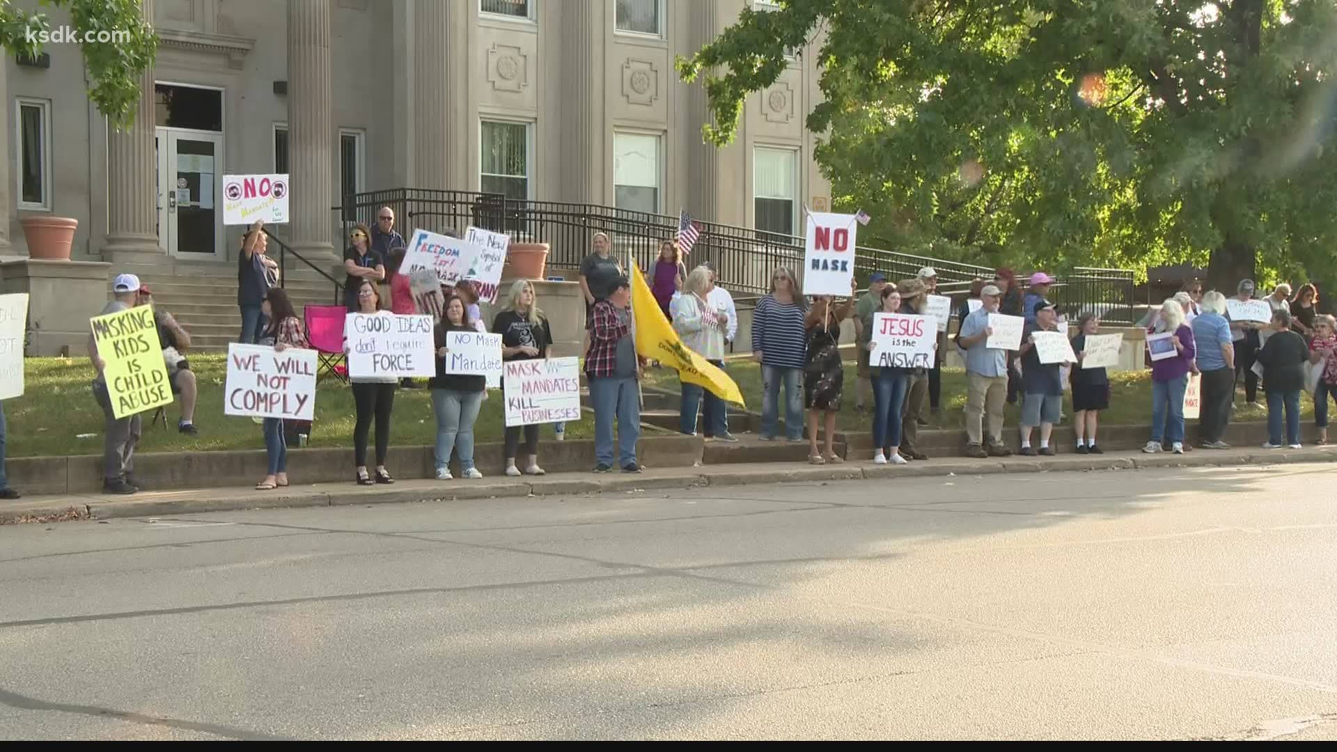 Protesters gathered outside the St. Francois County Government Center in Farmington