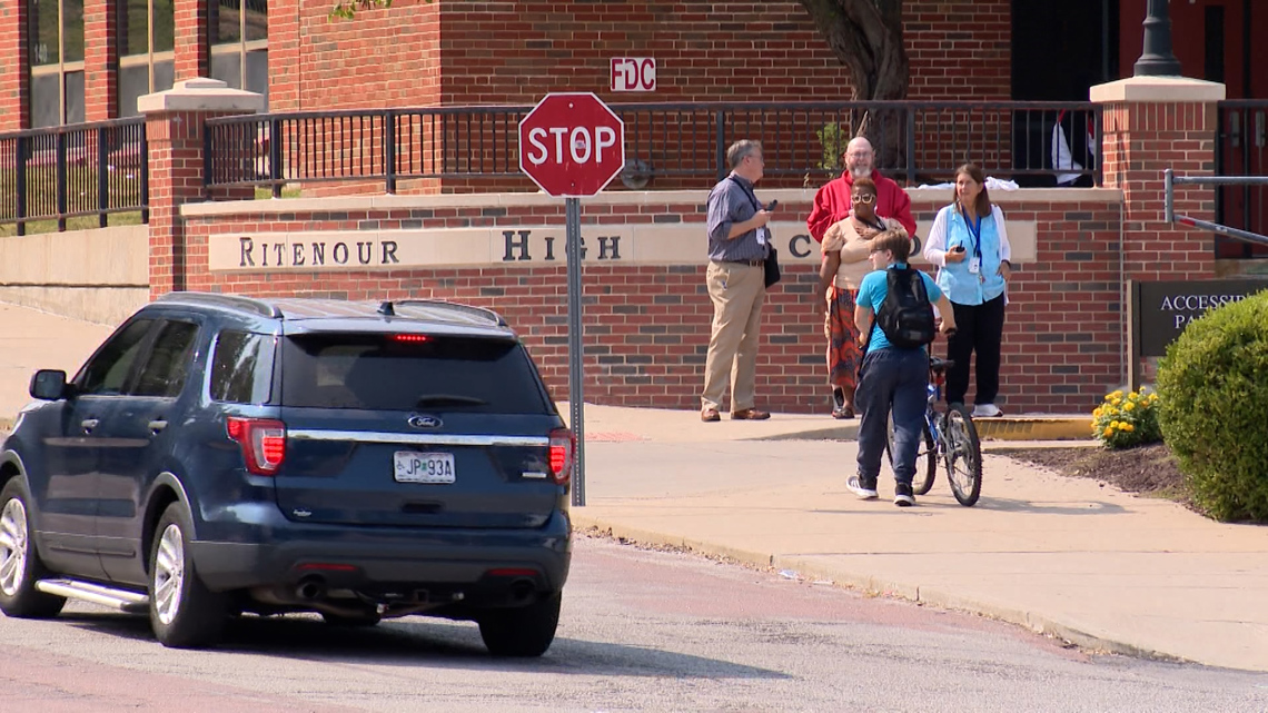 Parents charged after teenager arrested with gun at school