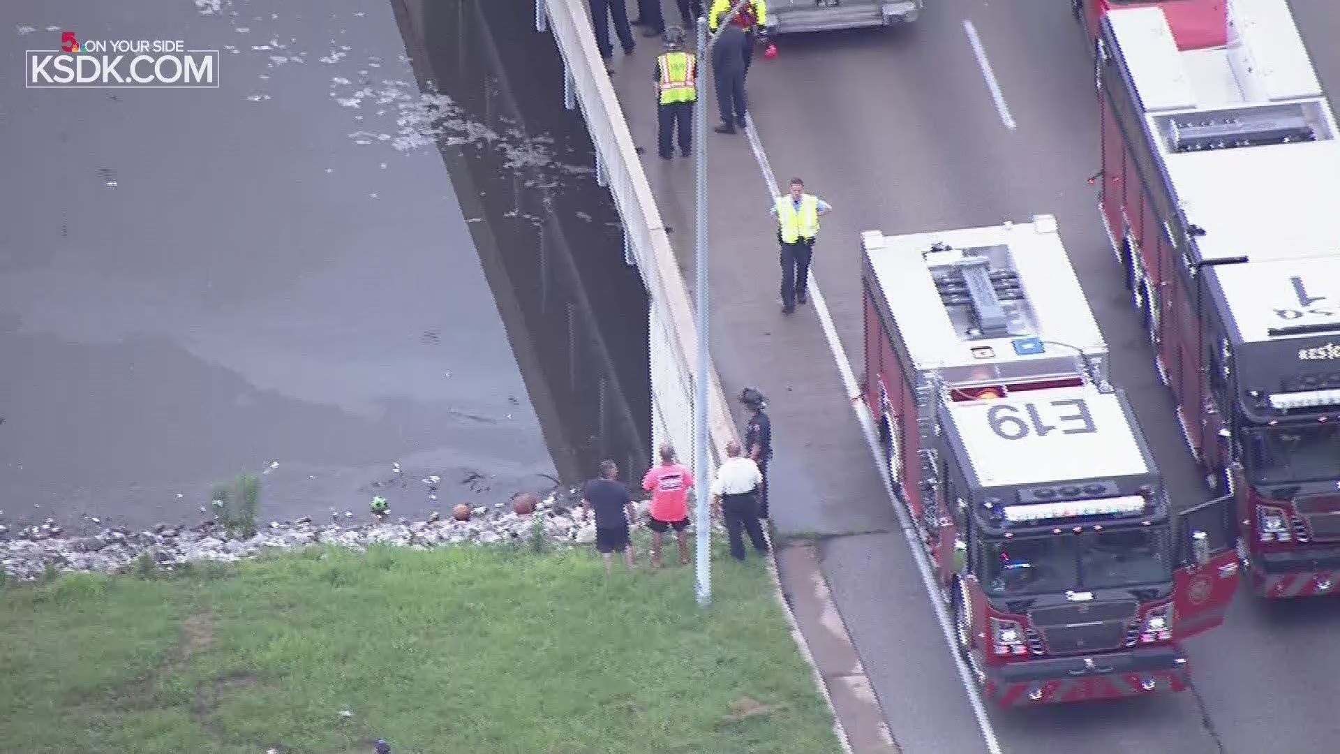 The preliminary report from police is that a vehicle hit a pole and then went into the river. However, the driver was able to get out before it went under.