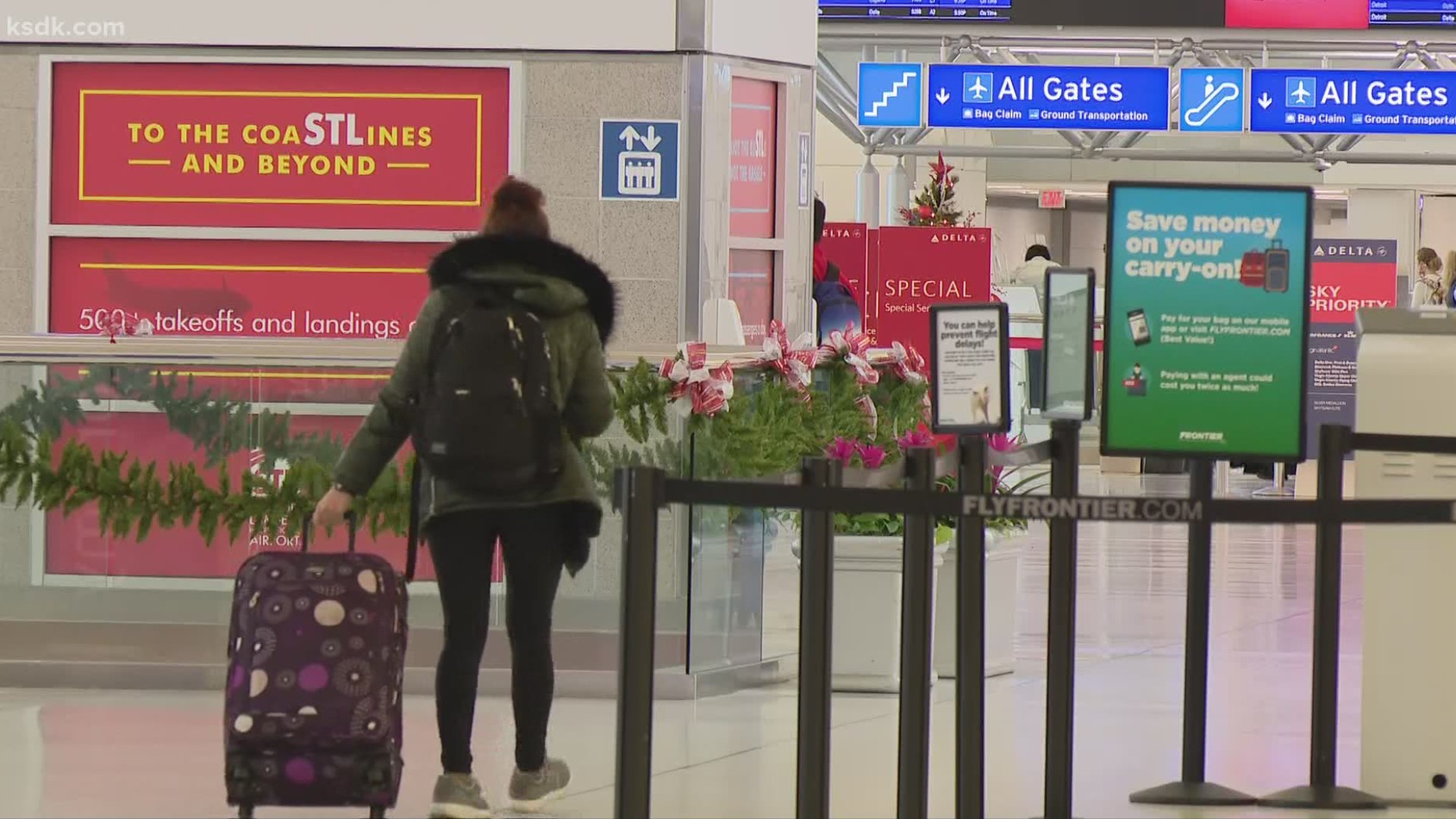 Airports have seen a decrease in holiday travelers, but some are still deciding to fly for Thanksgiving despite warnings