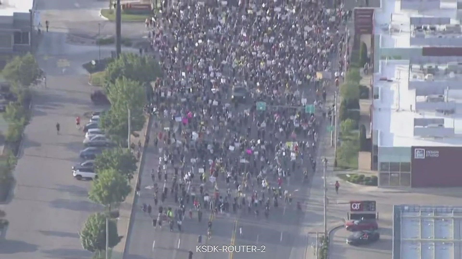 Hundreds march through Brentwood in a rally for George Floyd. This is helicopter video and has no sound.